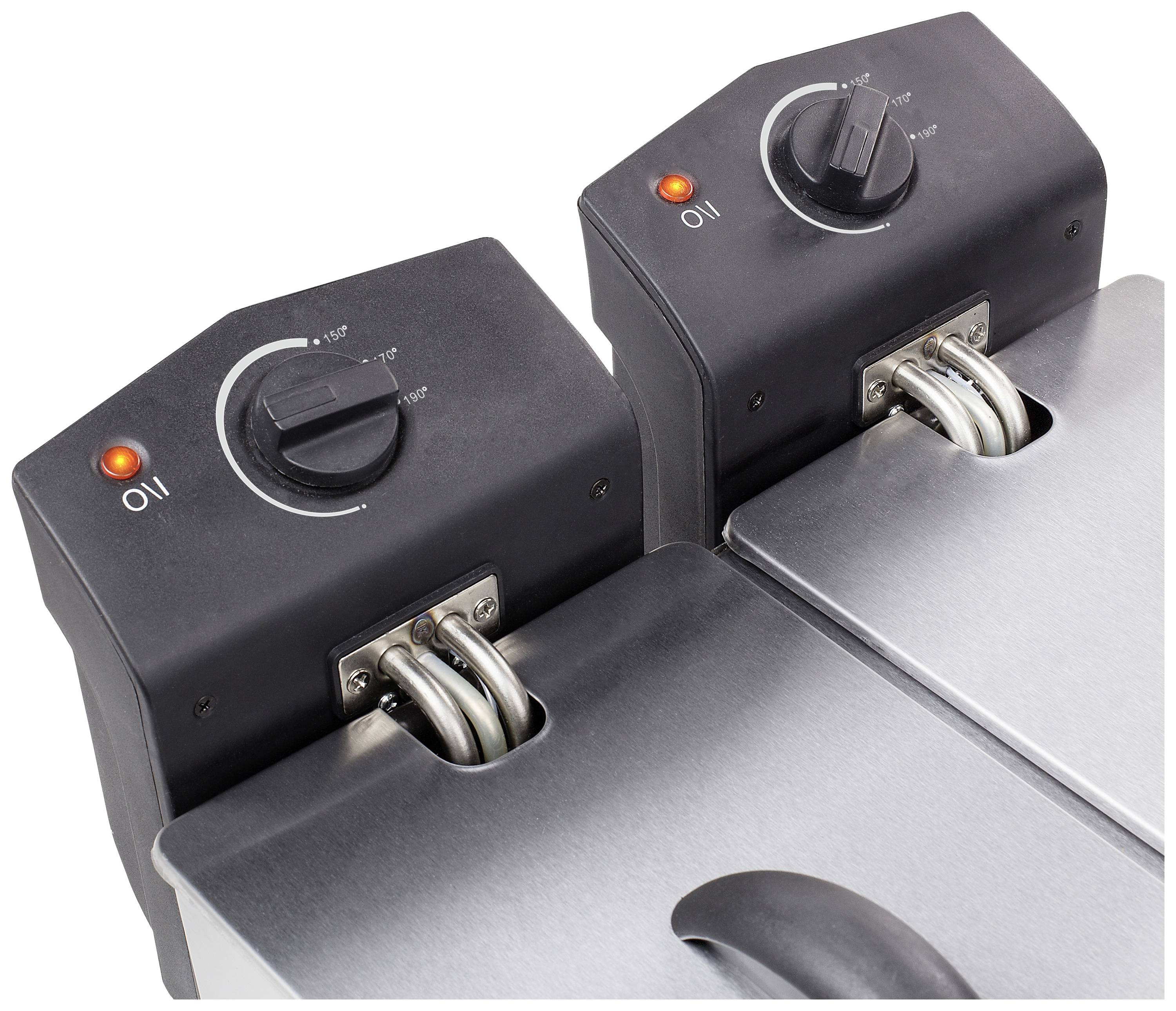 Zwei Fritteusen mit Temperaturreglern und leuchtenden Kontrolllampen, die auf Edelstahlgehäusen montiert sind.