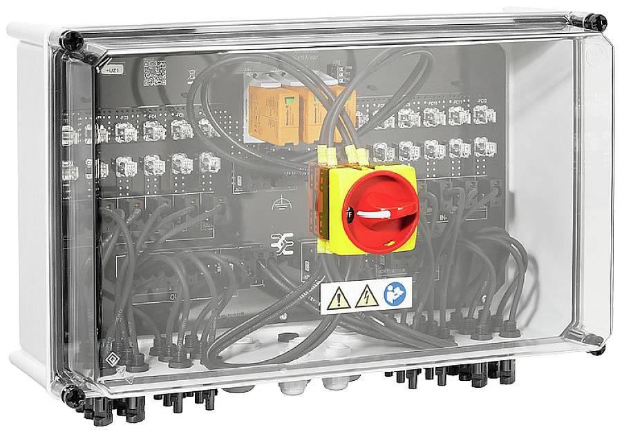 Elektrischer Schaltschrank mit rotem Not-Aus-Schalter in der Mitte. Schwarze Kabel und mehrere Anschlüsse sichtbar. Sicherheitswarnsymbole unten.