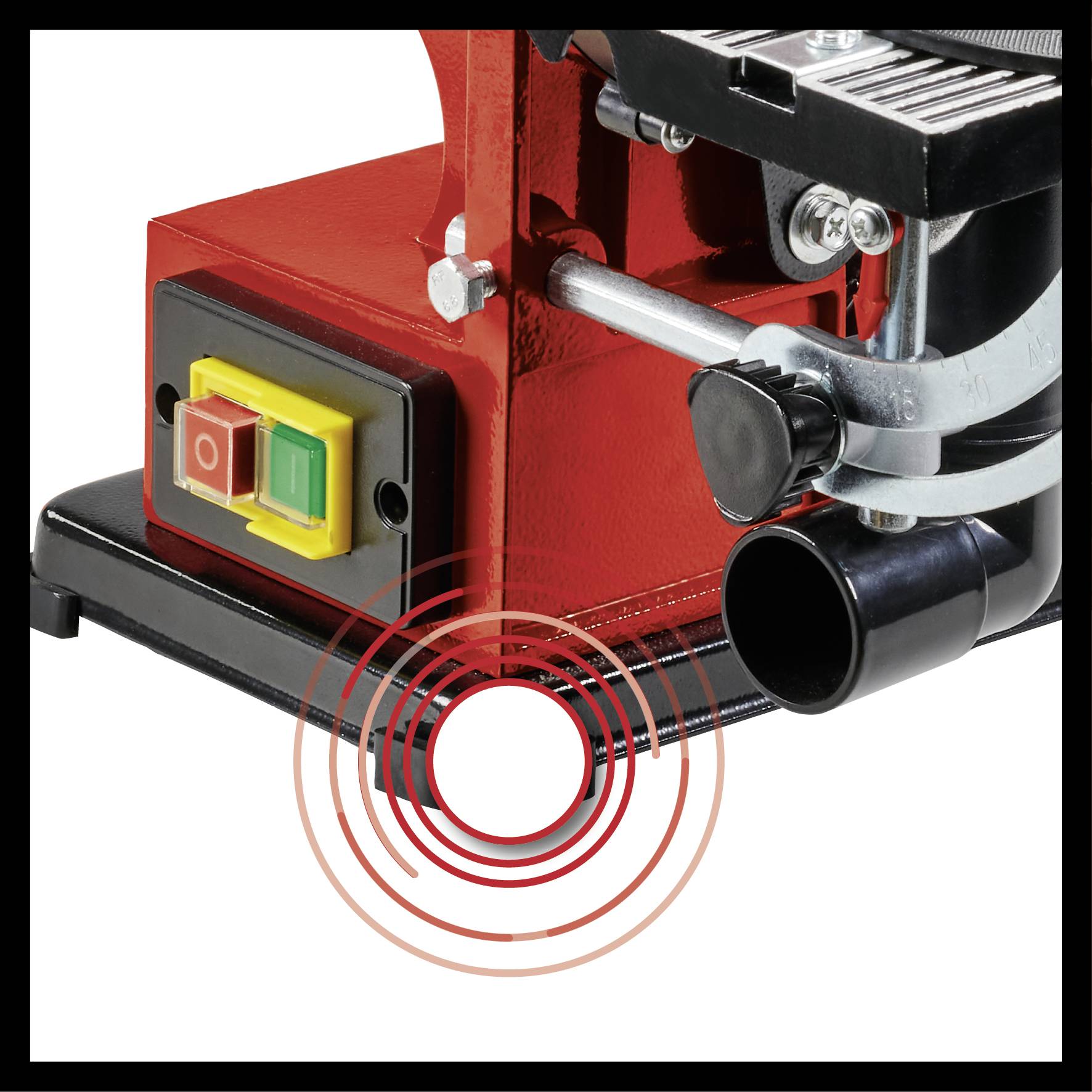 Ein rotes mechanisches Gerät mit einem schwarz-roten Schalter und einem Schallwellen-Symbol darunter, möglicherweise zur Lärmmessung.