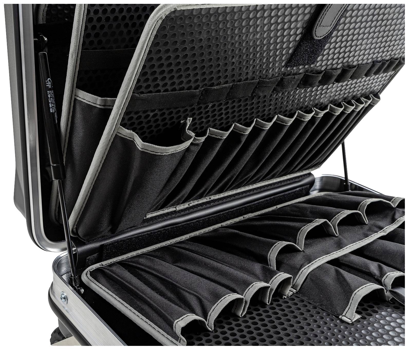 Offener Werkzeugkoffer mit vielen elastischen Halterungen im Inneren, geeignet zur organisierten Aufbewahrung von Werkzeugen.