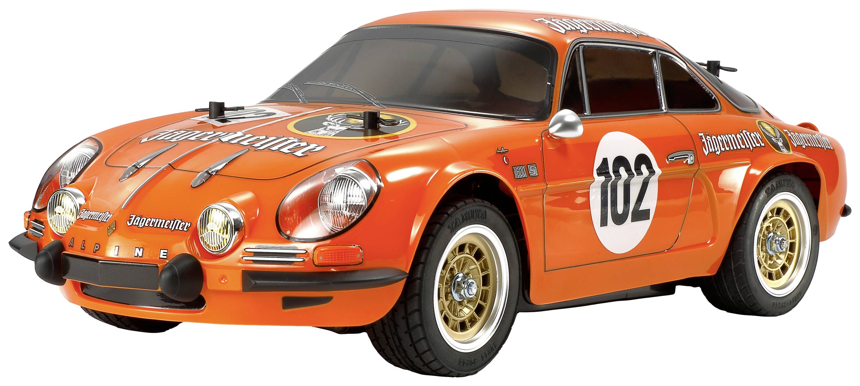 Ein orangefarbenes Modellauto mit der Nummer '102' auf der Seite, dekoriert mit 'Jägermeister'-Logos, symbolisiert ein Rennfahrzeug.