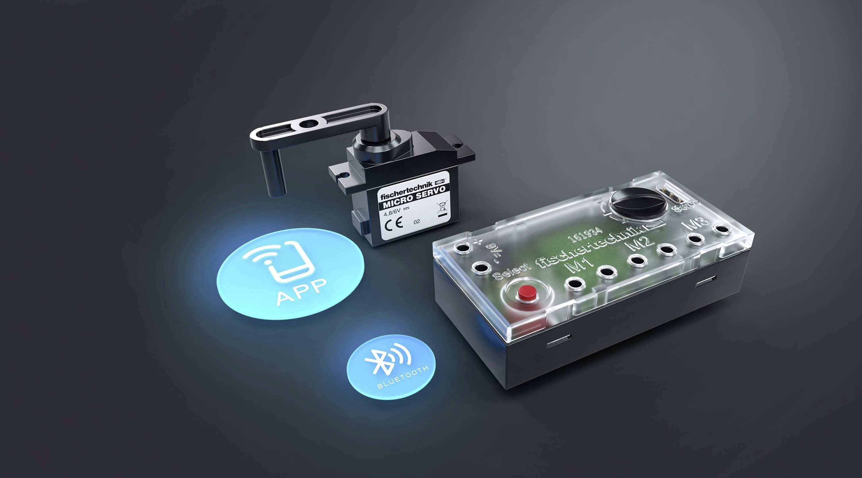 Abgebildet ist ein elektrisches Steuergerät mit Schaltern und Indikatoren, daneben zwei runde Symbole für App- und Bluetooth-Konnektivität.