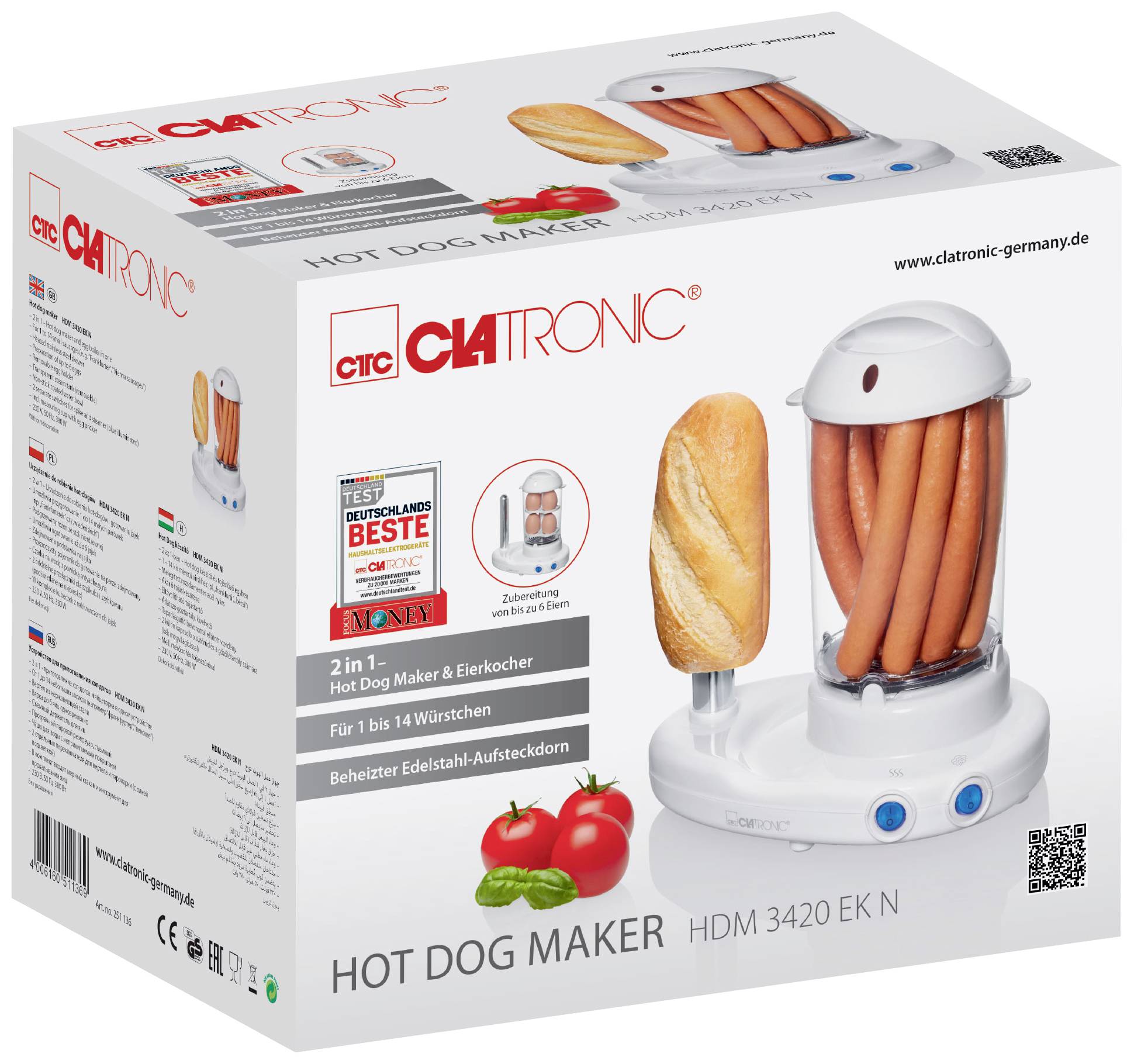 Verpackung eines 'Clatronic' Hot Dog Makers. Zeigt Gerät mit Würstchenhalter und Brotspieß. Bildet Würstchen und Tomaten als Deko ab.
