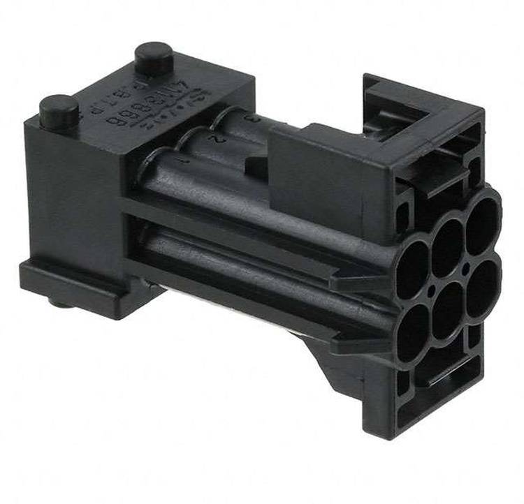 Ein schwarzer elektrischer Stecker mit mehreren zylindrischen Öffnungen, entwickelt zur Schnittstelle mit kompatiblen Geräten oder Kabeln.