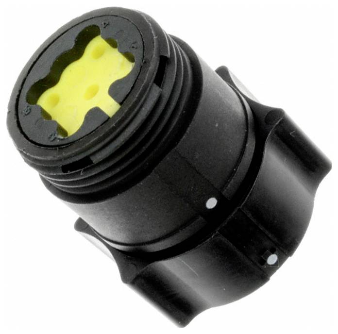 Ein schwarzer zylindrischer Kunststoffstecker mit gelbem Mittelteil und vier äußeren Kerben, typischerweise in elektrischen oder elektronischen Baugruppen verwendet.