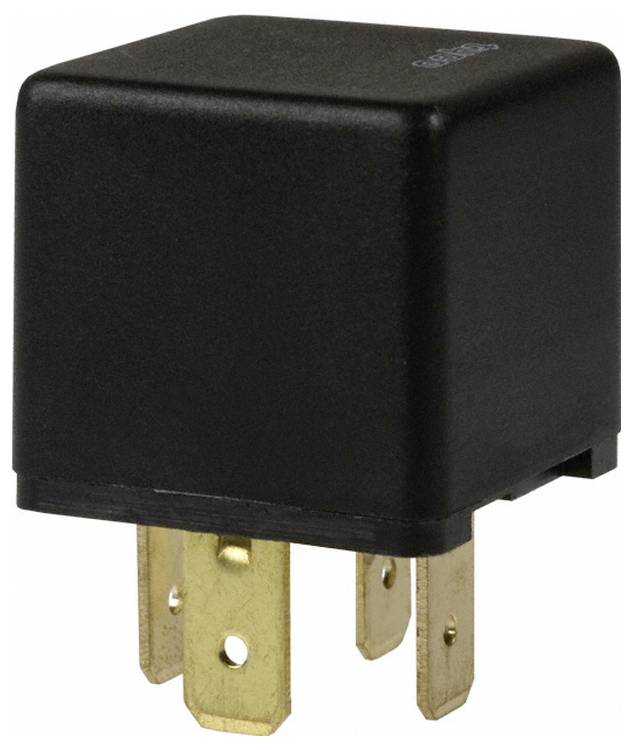 Ein schwarzes Kraftfahrzeug-Relais mit vier goldenen Metallstiften für elektrische Verbindungen, das zur Steuerung von Schaltkreisen in Fahrzeugen verwendet wird.