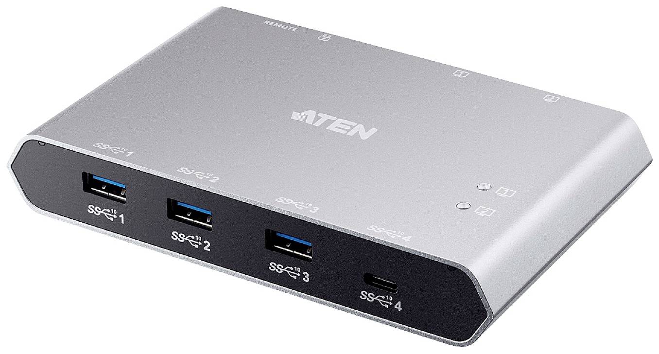 Silberner USB-Hub mit vier Anschlüssen auf der Vorderseite, markiert von SSC 1 bis SSC 4. Oberseite trägt das Logo.
