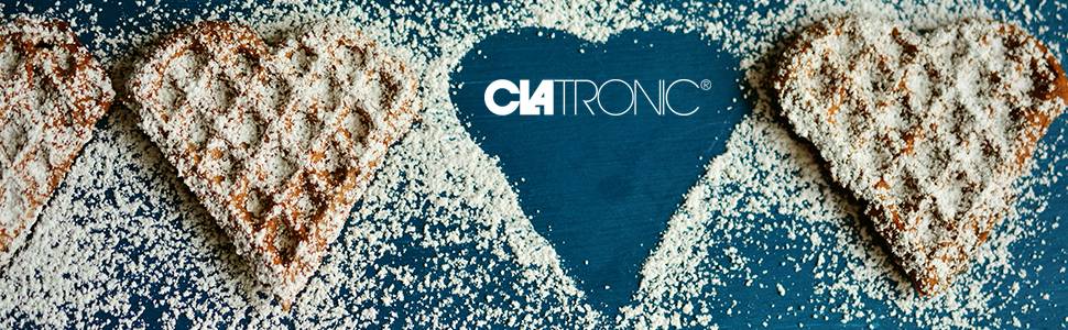 Herzwaffeln auf blauem Hintergrund, mit Puderzucker bestreut. Im Hintergrund erscheint das Wort 'Clatronic'.