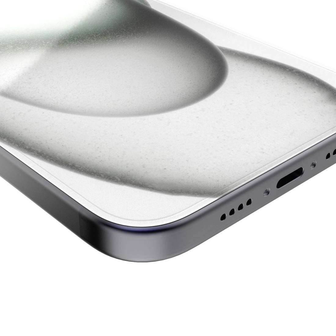 Nahaufnahme eines Smartphone-Rahmens mit abgerundeten Kanten und silbernem Metallic-Finish; Ladeanschluss und Lautsprecher sichtbar.