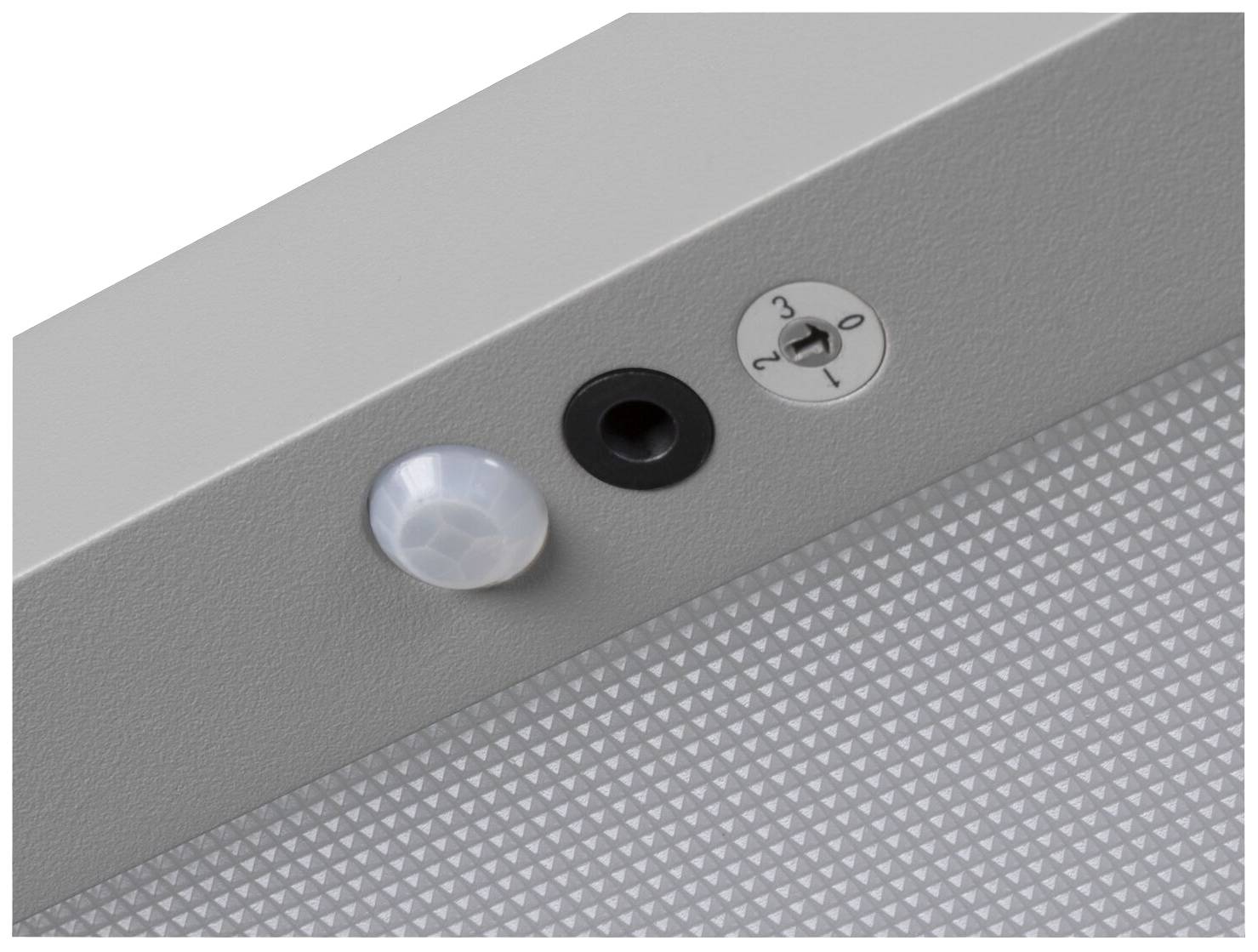 Ein grauer Lichtschalter mit Sensor und Drehregler in Nahaufnahme, der Teil eines Beleuchtungssystems ist.