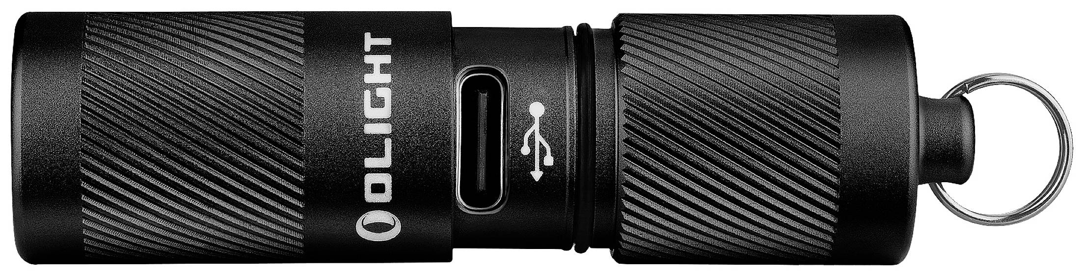 Kleine schwarze Taschenlampe mit USB-Anschluss und Schlüsselring. Kompaktes, zylindrisches Design mit geriffelter Oberfläche für besseren Halt.