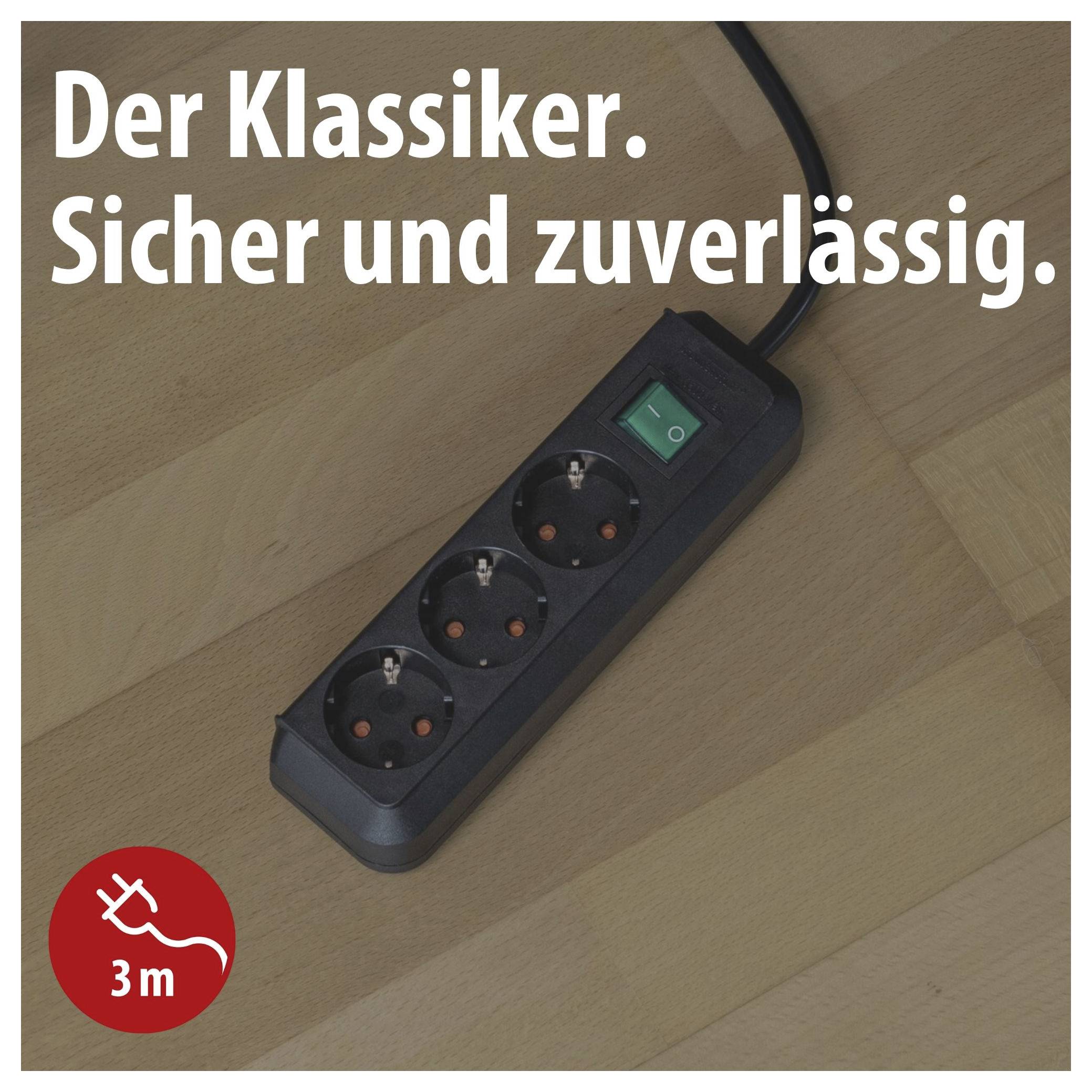 Mehrfachsteckdose mit Schalter auf Holzboden; Text: 'Der Klassiker. Sicher und zuverlässig.' sowie Symbol '3 m'.