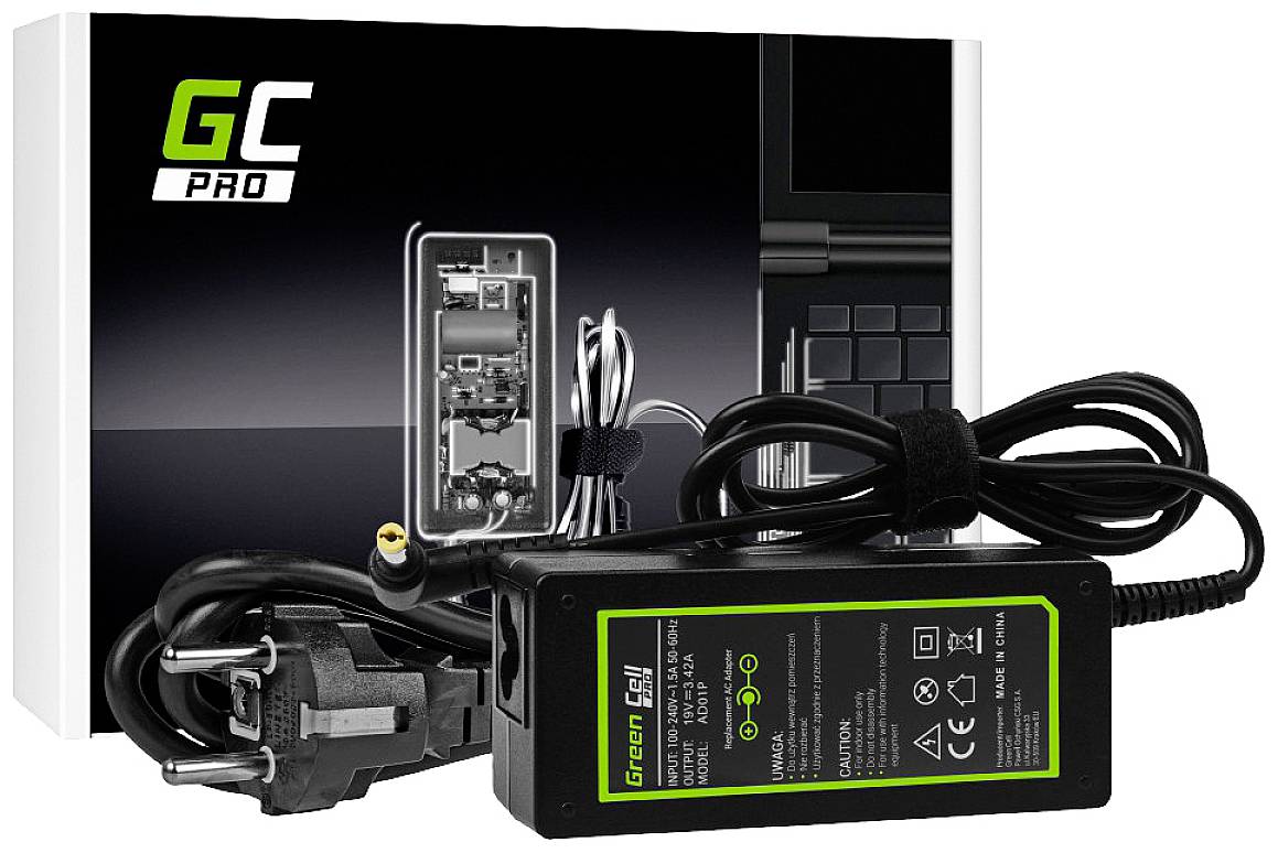 Ladegerät und Kabel von Green Cell vor einer Verpackung, die ein Notebook und technische Details zeigt. Fokus liegt auf der Ladeeinheit.