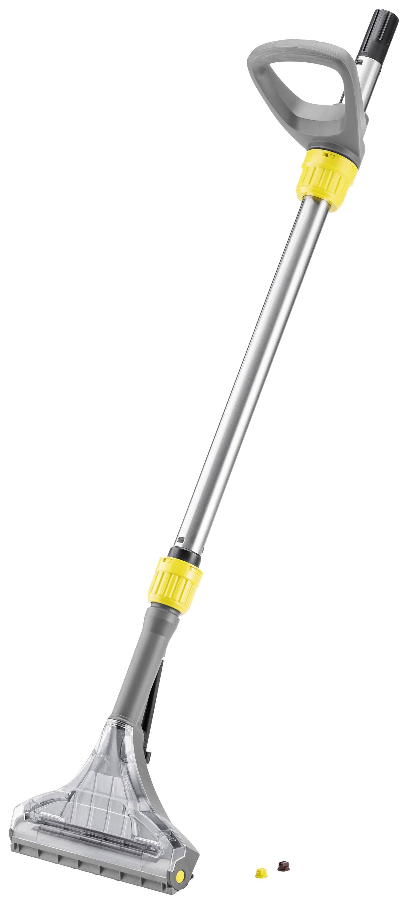 Ein grauer und gelber Teppichreiniger mit einem langen Griff und einem Reinigungskopf unten, ideal für die Entfernung von Schmutz.