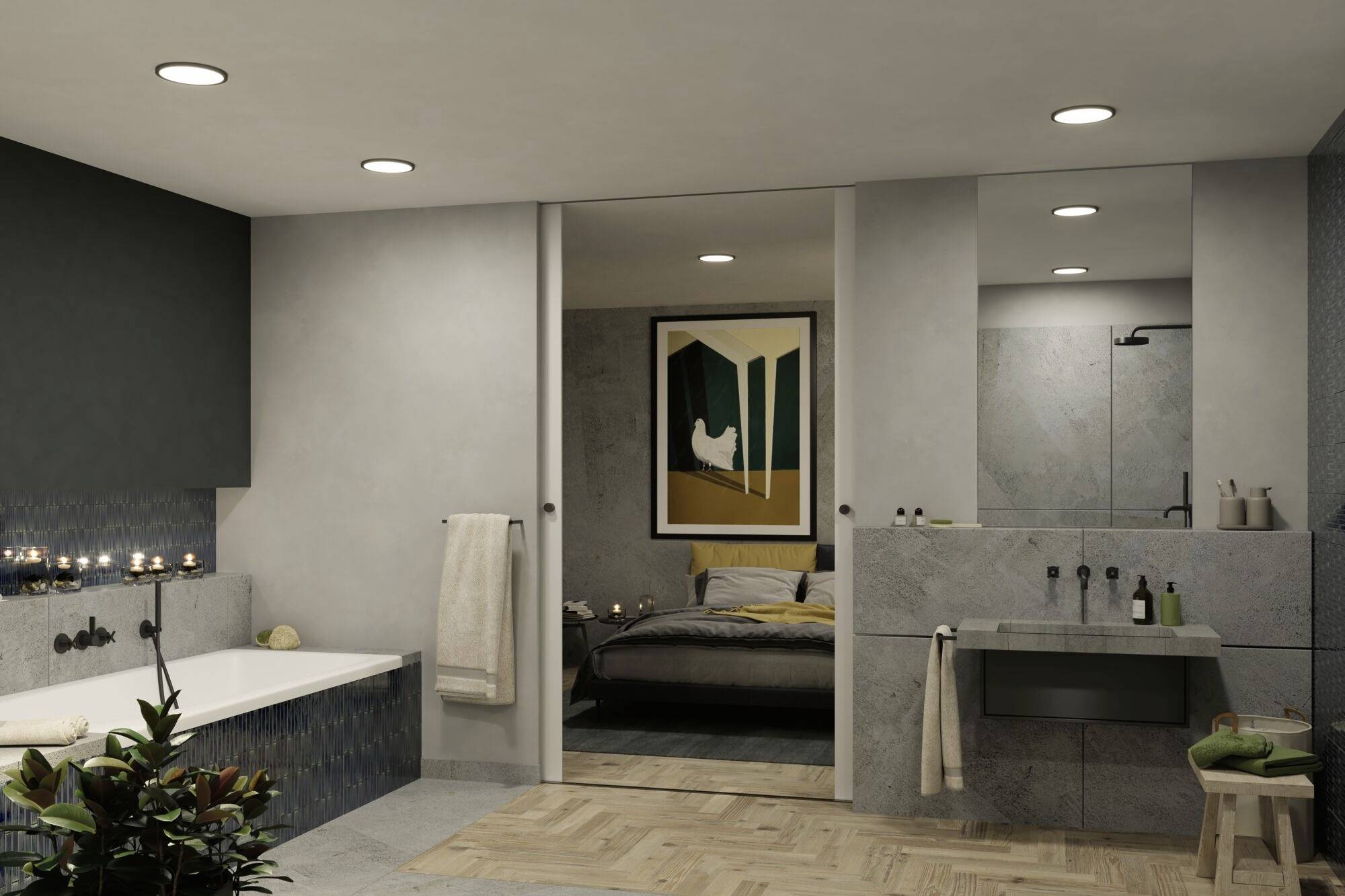 Modernes Badezimmer mit Badewanne, Pflanzen und Handtüchern; im Hintergrund ein Schlafzimmer mit Gemälde an der Wand.