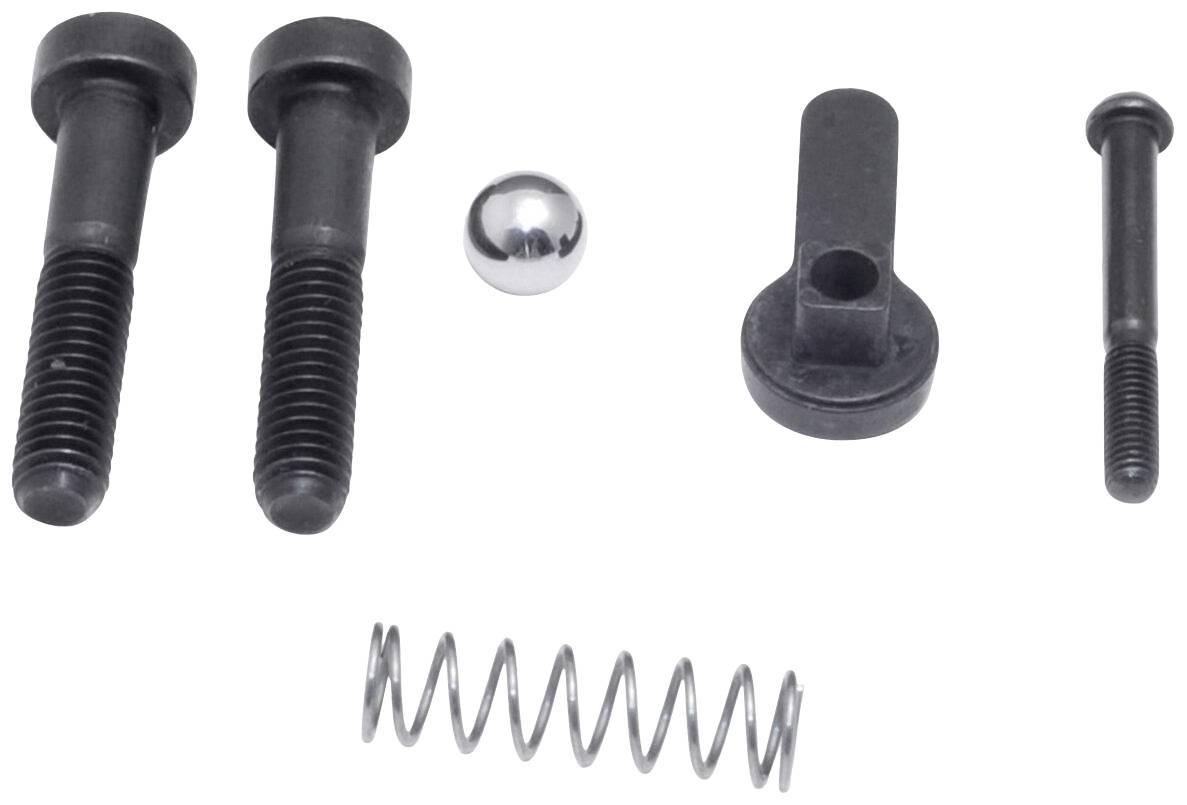 Set mit zwei Schrauben, einer Feder, einer Metallkugel und zwei weiteren Befestigungsteilen, die für mechanische Montage verwendet werden.