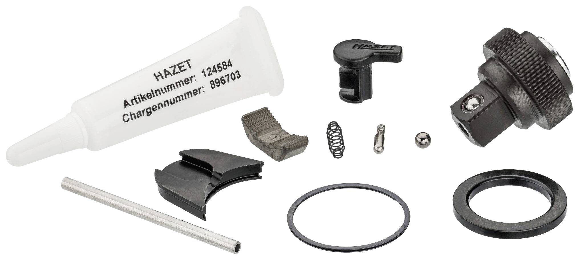 Ein Reparatursatz für ein Werkzeug bestehend aus mehreren Komponenten: Kunststoffflasche, Federn, Hebel, Schrauben und O-Ring.
