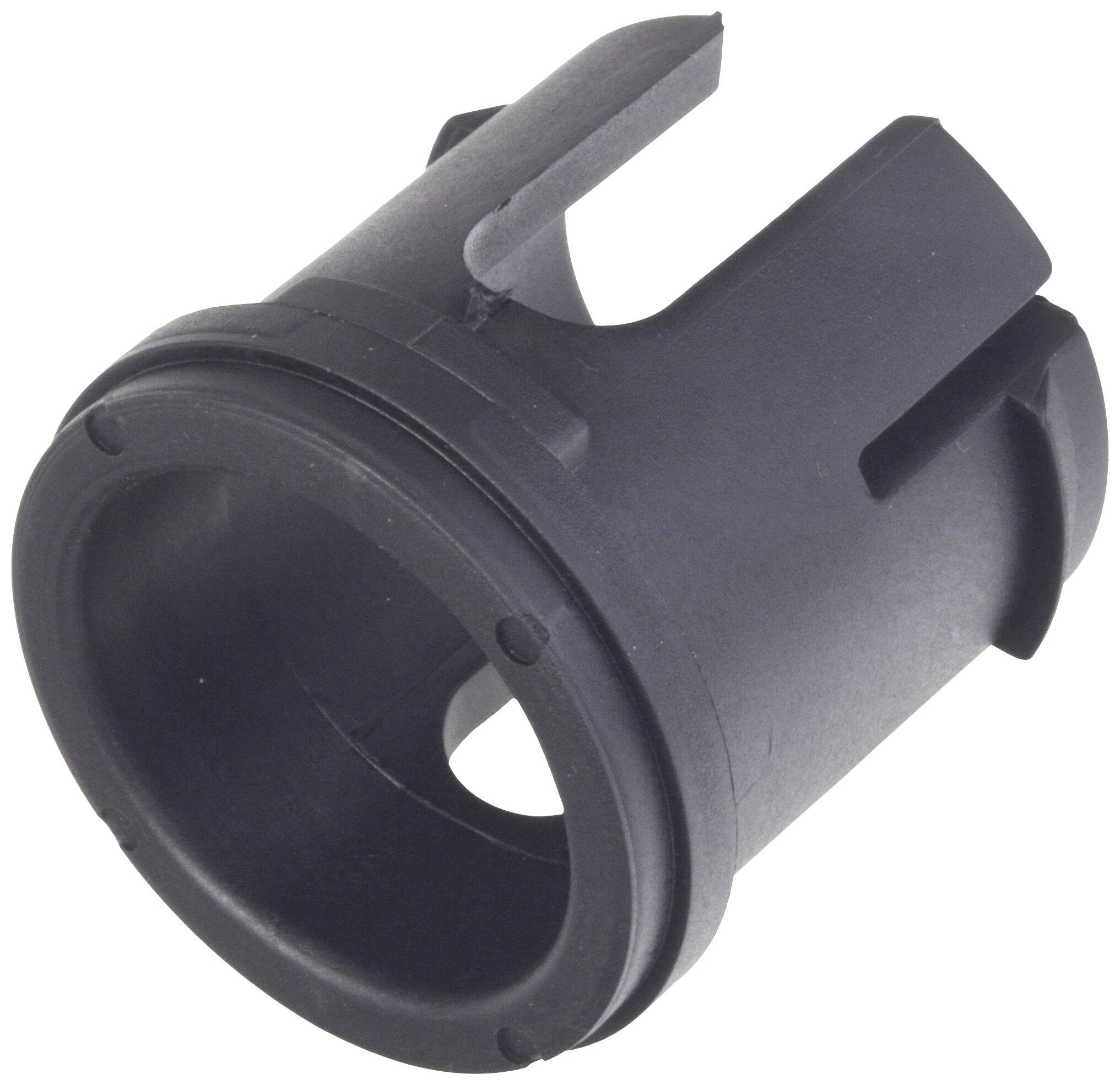 Ein schwarzes zylindrisches Kunststoffteil mit vier äußeren Rillen, möglicherweise ein Maschinenteil oder Adapter.