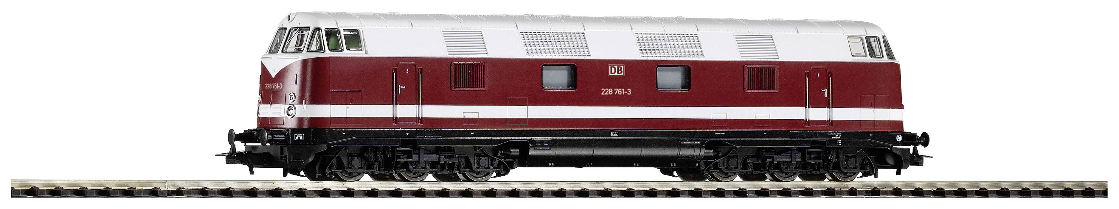 Dies ist ein Modell einer roten und weißen Diesellokomotive auf einem Gleis, mit der Aufschrift 'DB'. Sie hat eine kantige Form.