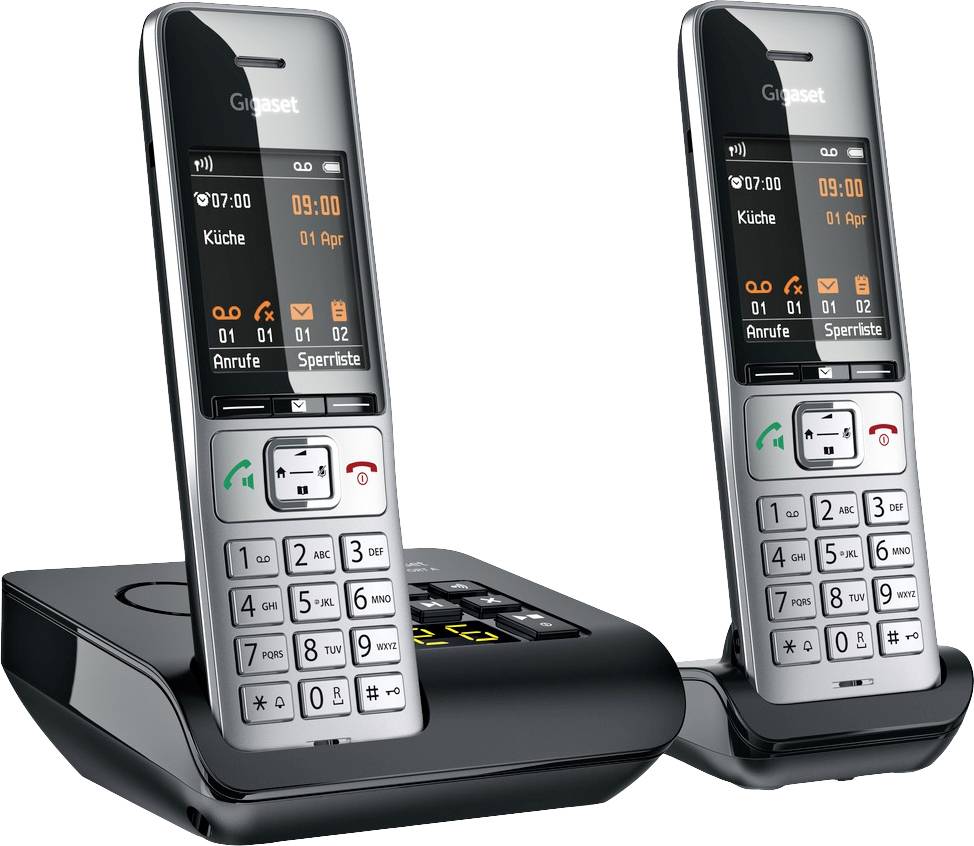Zwei schwarze schnurlose Telefone mit Display und Tastenfeld auf Ladegeräten. Zeigen Datum, Uhrzeit und 'Küche' an.