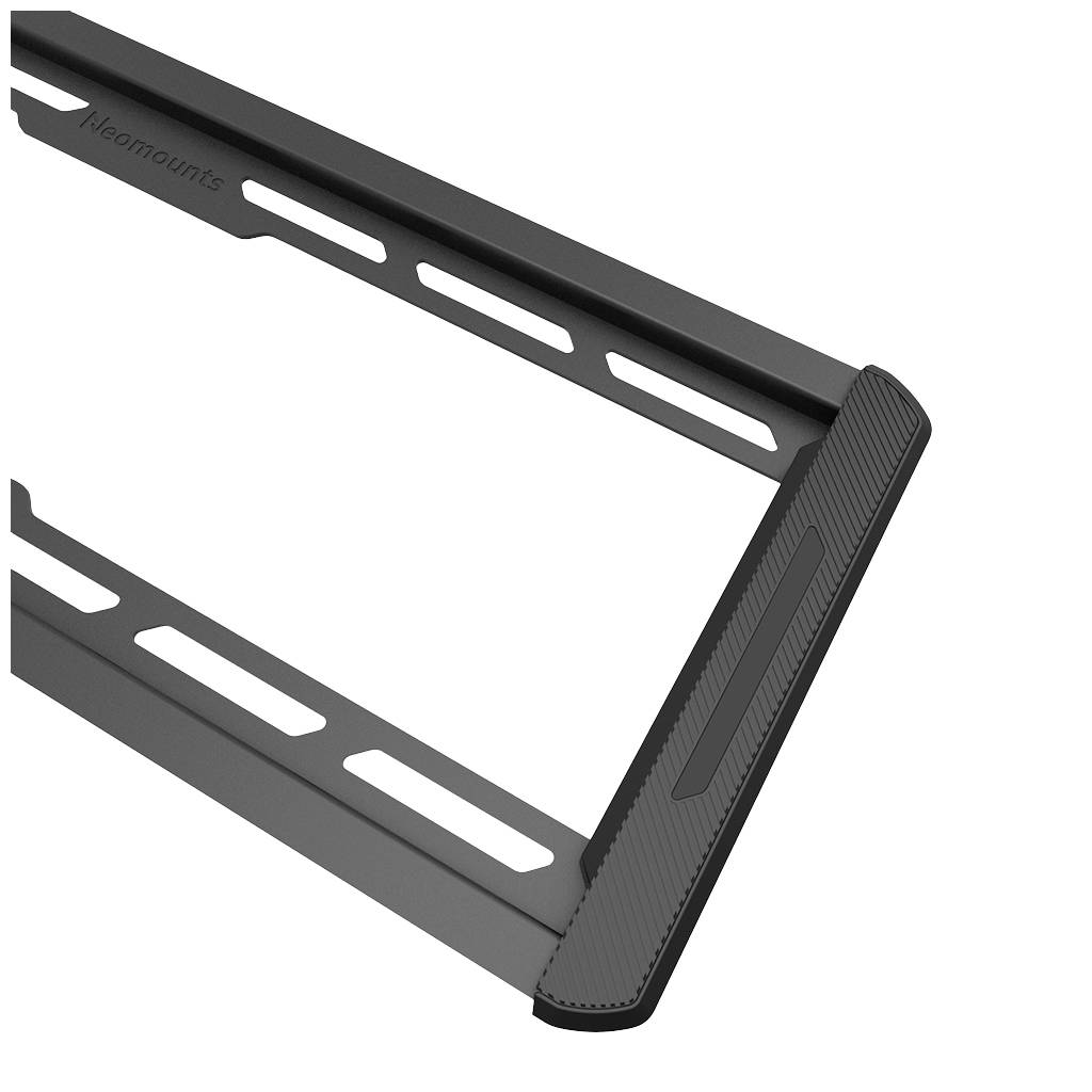 Metallische Halterung mit geschlitztem Design und Schrauböffnungen, möglicherweise für die Befestigung von Geräten an einer Wand oder Oberfläche.