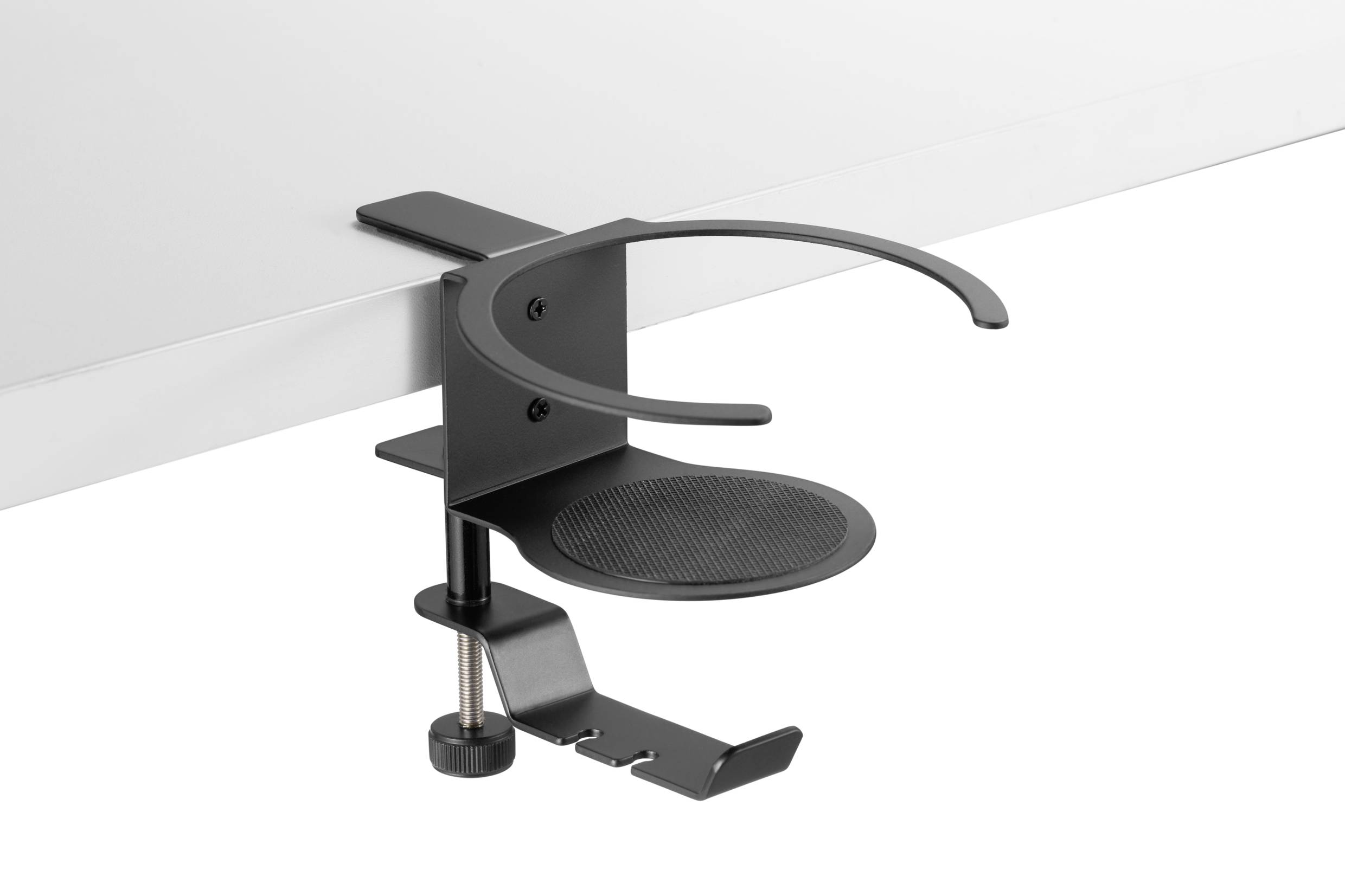 Ein schwarzer Getränkehalter ist an die Kante eines weißen Tisches geklemmt. Der Halter hat einen runden Sockel und eine offene Seite.