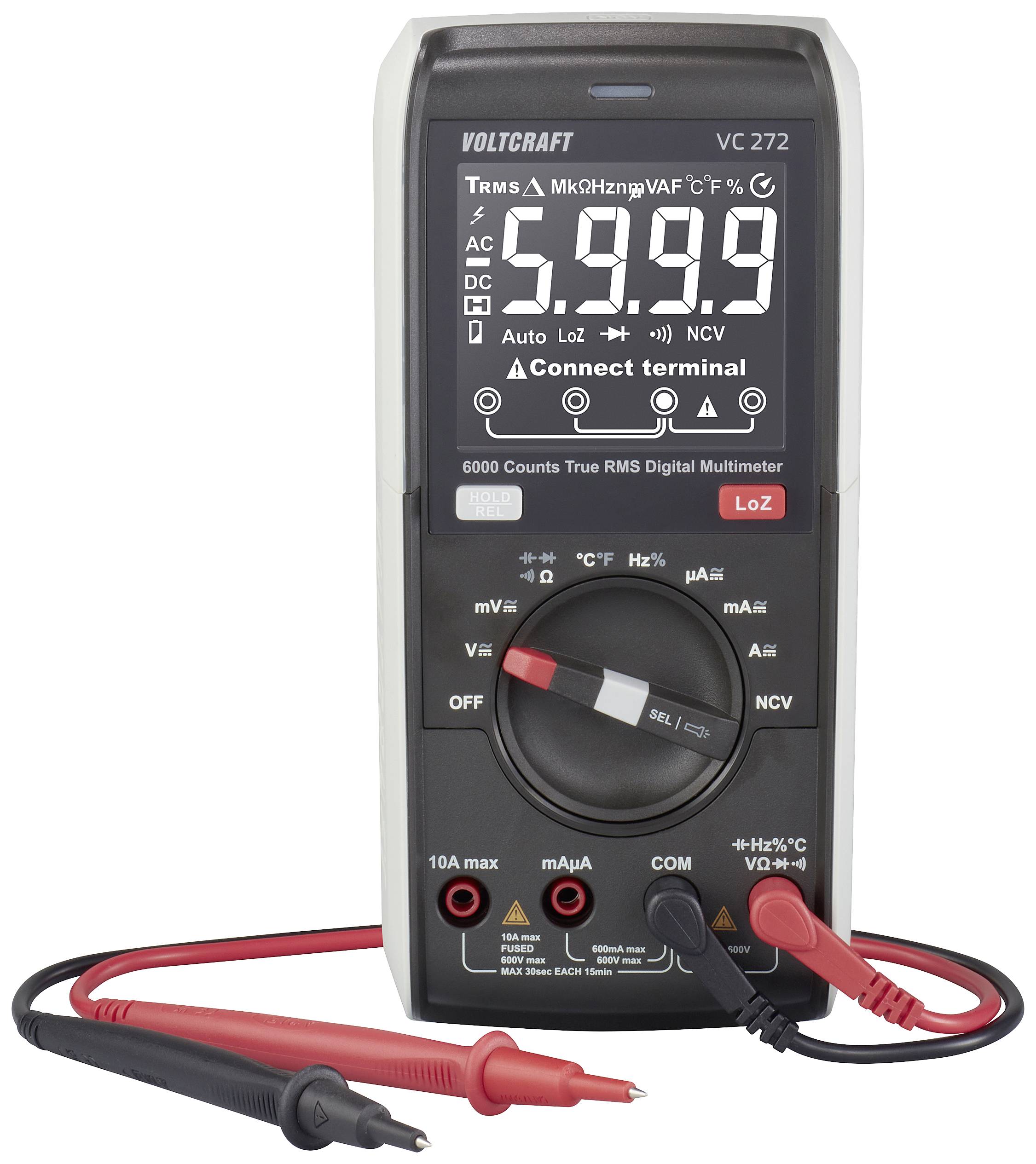 Digital-Multimeter zeigt auf dem Display '5.999'. Zwei Messleitungen vorne verbunden. Markenname 'Voltcraft' oben sichtbar.