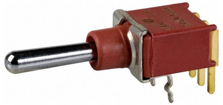 Ein roter Kippschalter mit einem Metallhebel und gelben Stiften für elektrische Verbindungen.