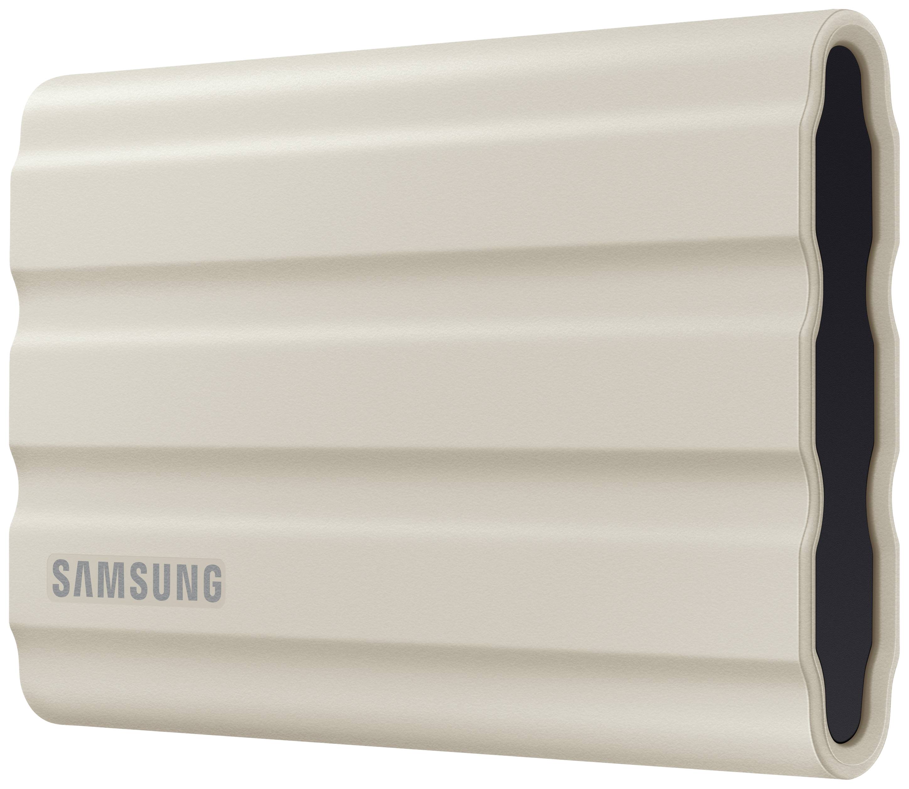 Externe beige Samsung-Festplatte mit geriffeltem Design. Ideal zur Datensicherung und -speicherung. Kompaktes, modernes Aussehen.