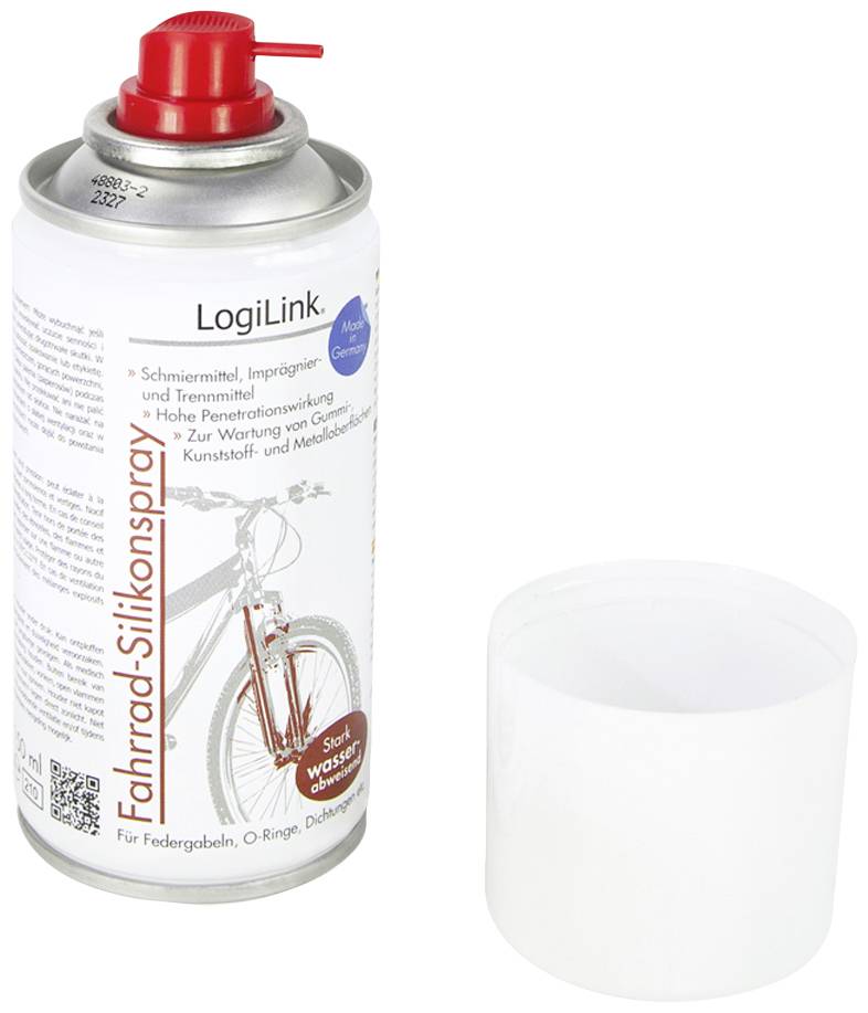Sprühdose mit rotem Deckel. Beschriftet mit Fahrrad-Silikonspray zur Pflege und Wartung. Nebenstehender transparenter Deckel.
