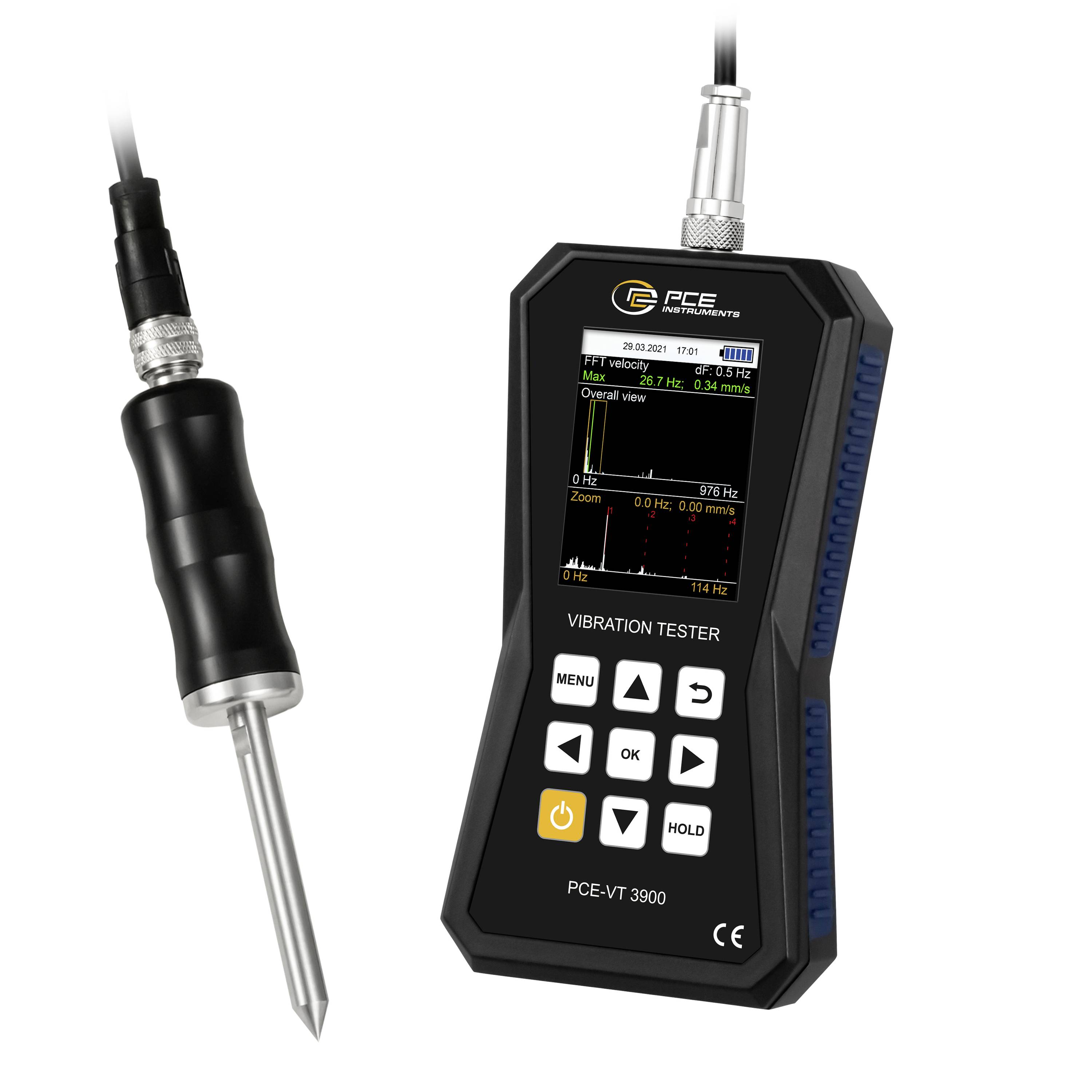 Tragbarer PCE-Vibrationsprüfer mit angebrachter Sonde, zeigt einen Bildschirm mit Vibrationsmesswerten und Steuertasten auf weißem Hintergrund.