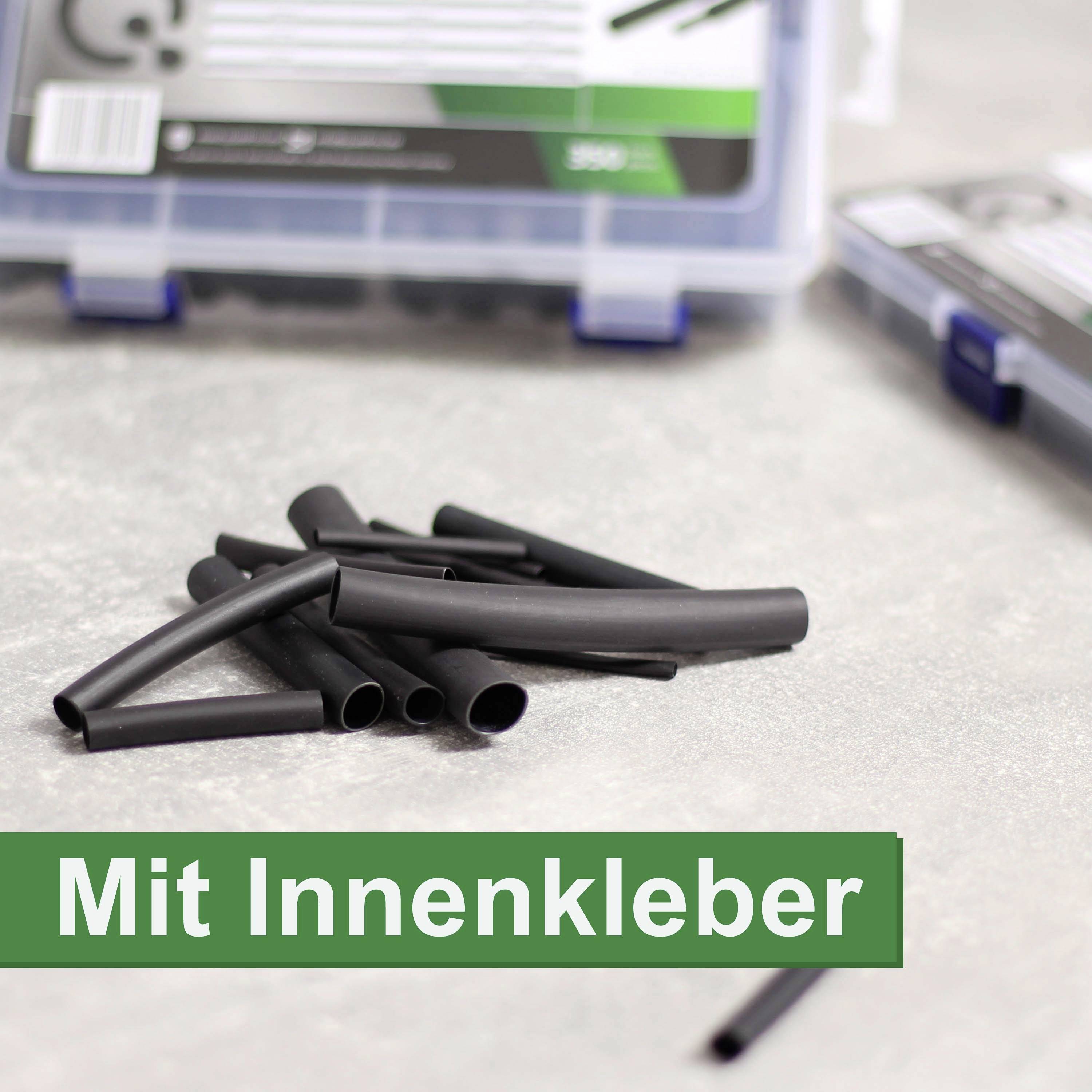 Schwarze Schrumpfschläuche auf grauer Oberfläche, im Hintergrund transparente Box. Grüner Text 'Mit Innenkleber' im Vordergrund.