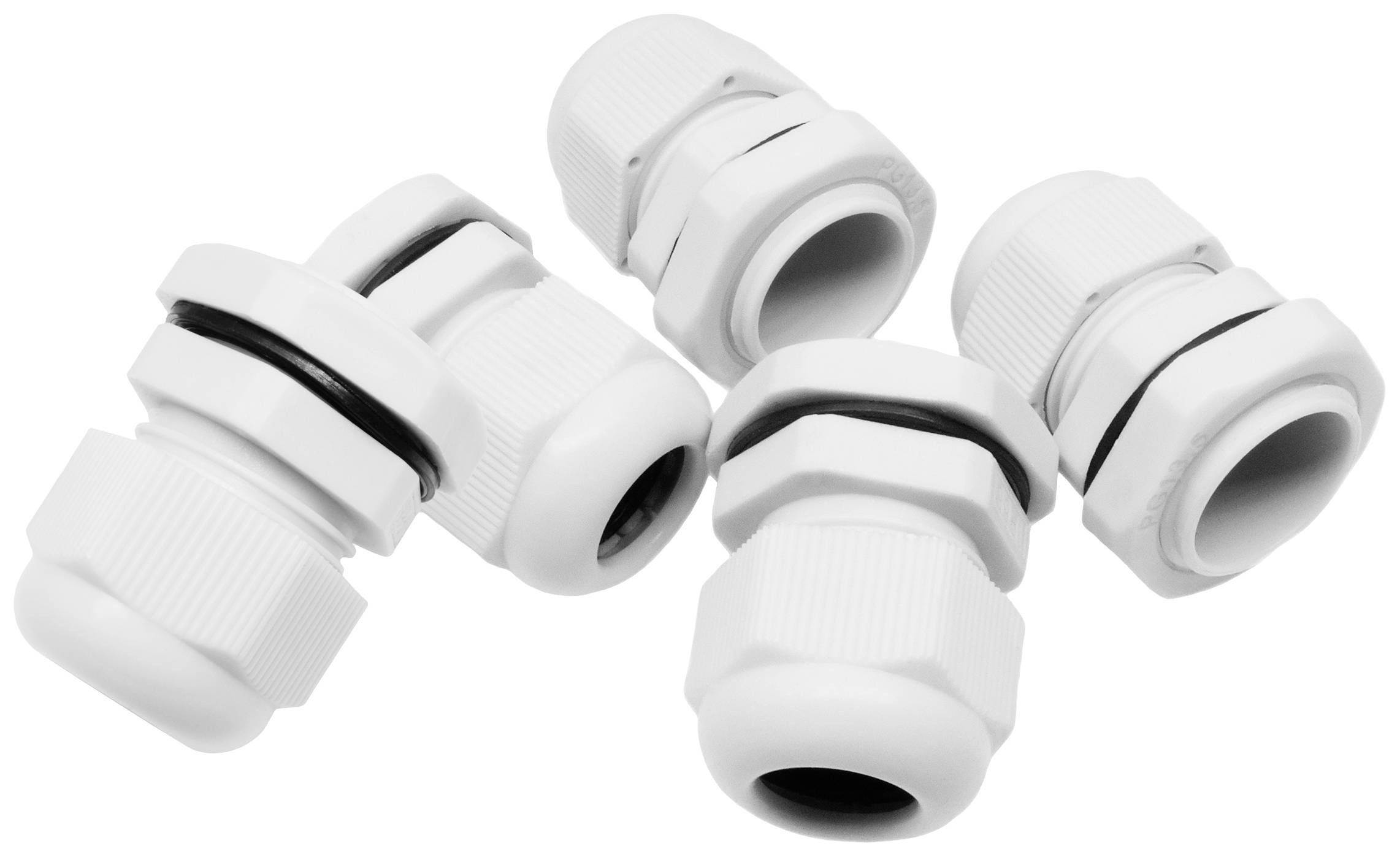 Fünf weiße Kabelverschraubungen liegen verteilt. Sie werden zur sicheren Kabeldurchführung und Abdichtung genutzt.