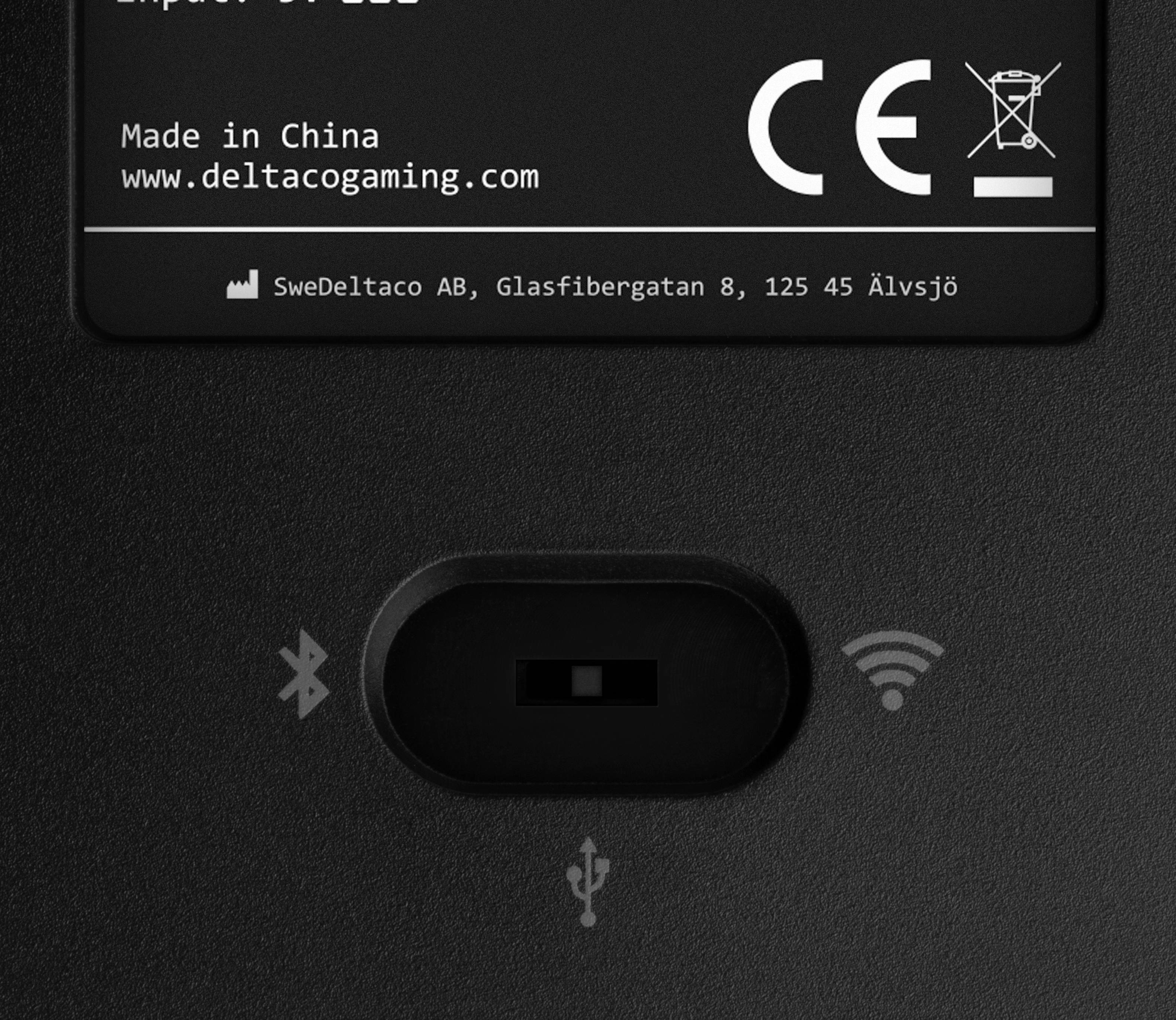 Rückseite eines elektronischen Geräts mit CE-Kennzeichnung. Zeigt Bluetooth-, WLAN- und USB-Symbole sowie Herstellerinformationen.