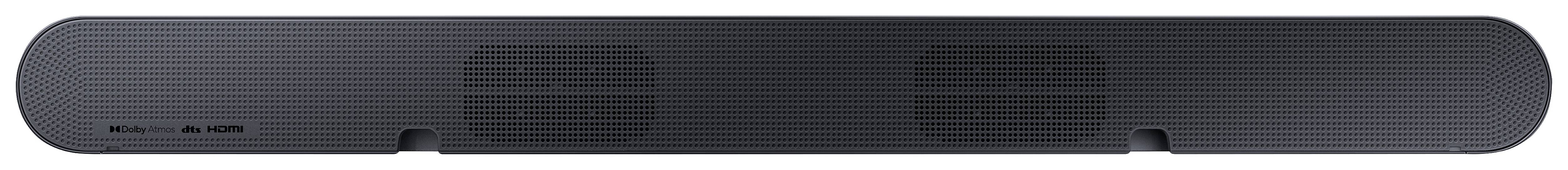 Schwarze, rechteckige Soundbar mit abgerundeten Kanten und zwei sichtbaren Lautsprechergittern, freistehend auf einem Untergrund.