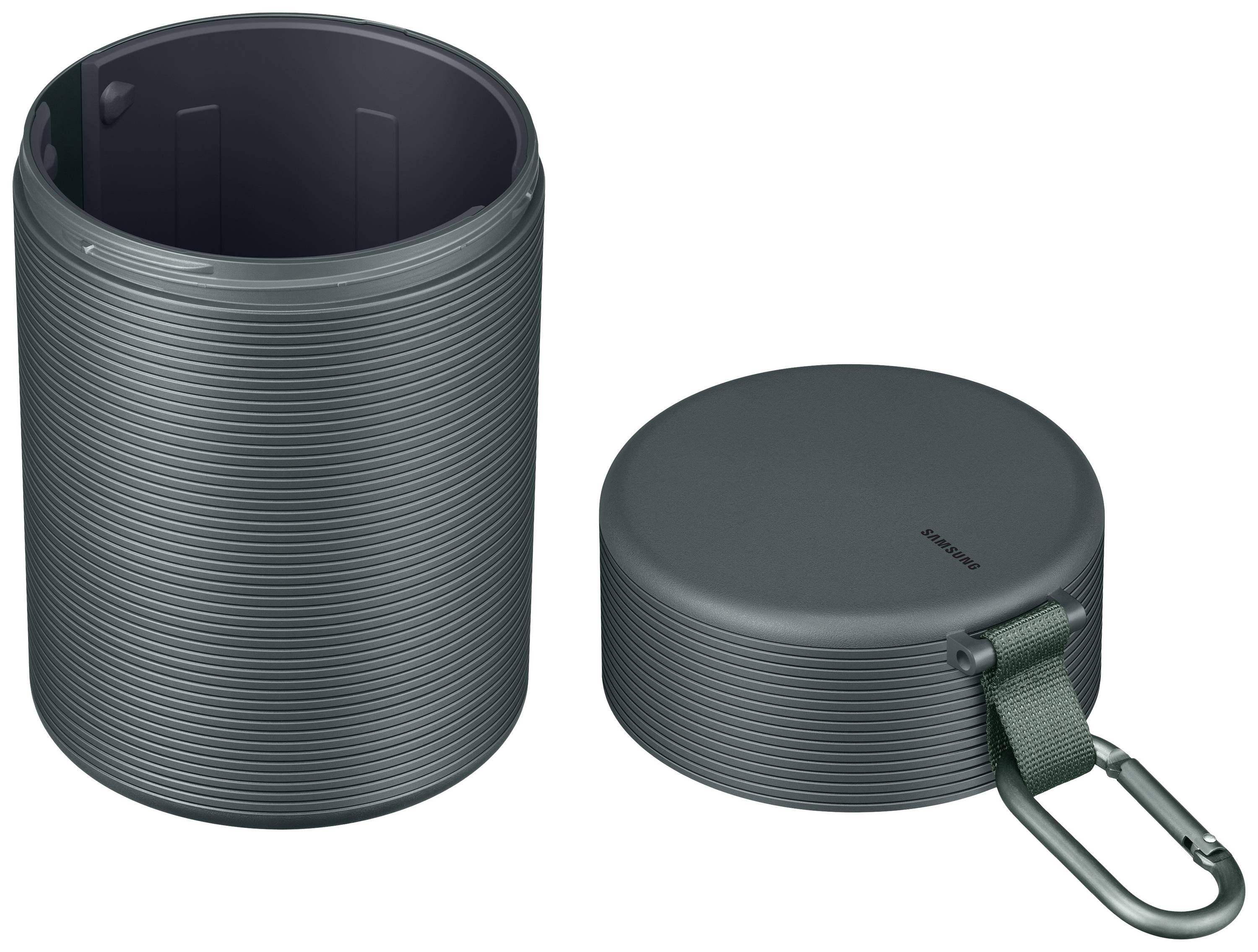 Ein runder, grauer Behälter mit Rippenstruktur. Der Deckel mit Karabinerhaken liegt daneben.