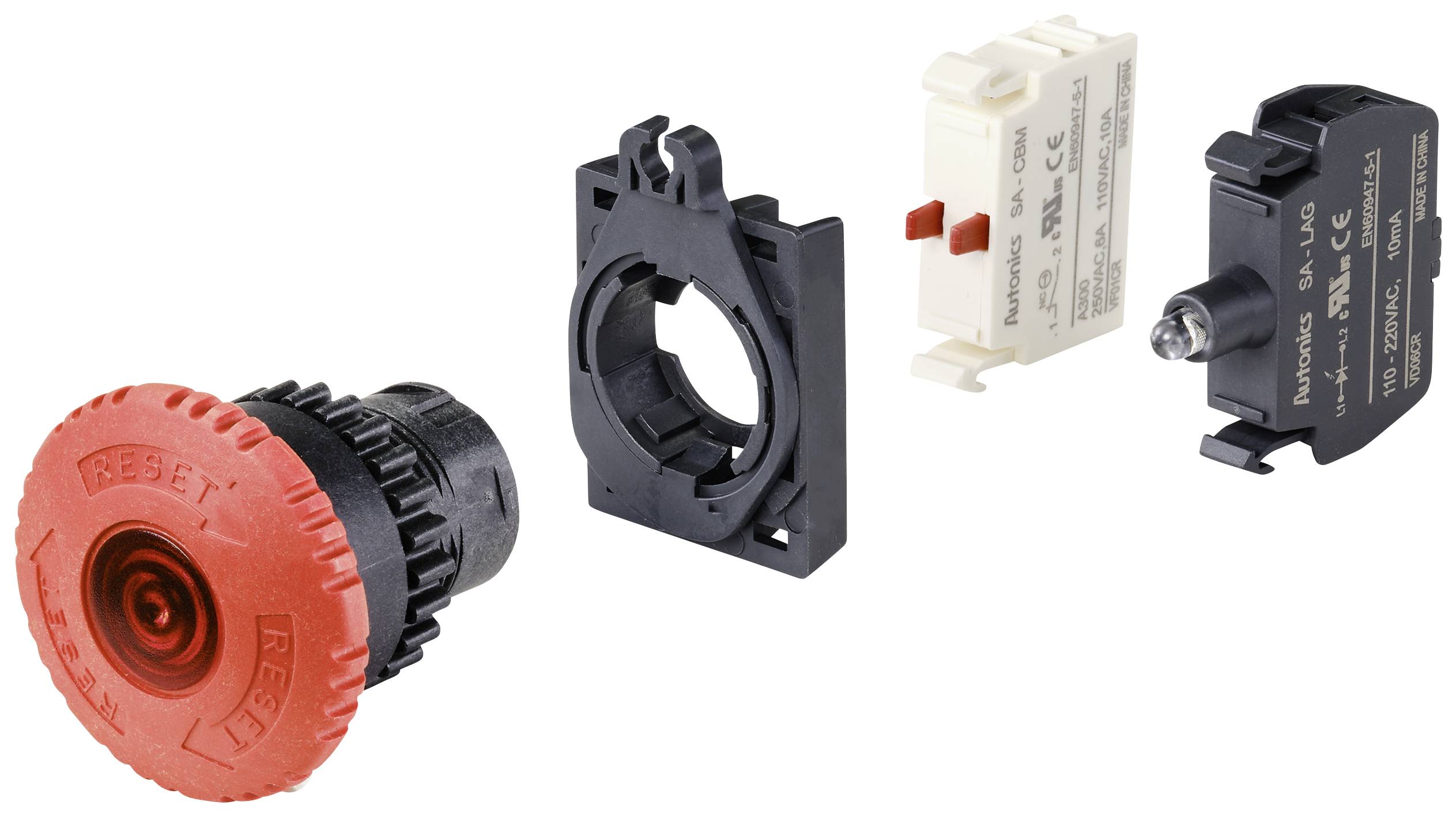 Ein roter Not-Aus-Schalter, zerlegt in fünf Teile: Gehäuse, roter Knopf, Befestigungsring und zwei elektrische Kontakte.