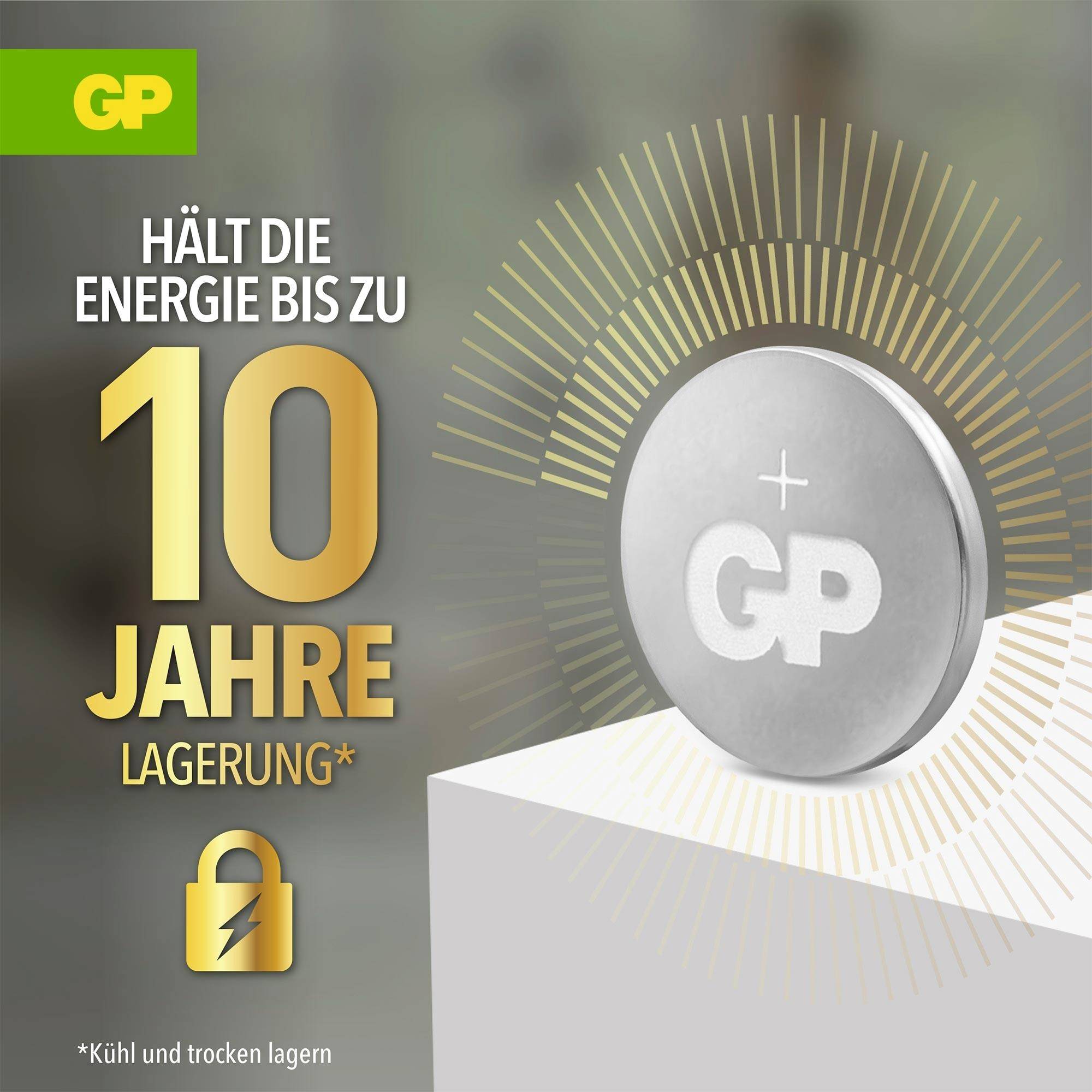 Werbeanzeige für GP-Batterie: 'HÄLT DIE ENERGIE BIS ZU 10 JAHRE LAGERUNG*', mit Batterie und Schloss-Symbol; Hinweis: '*Kühl und trocken lagern'.