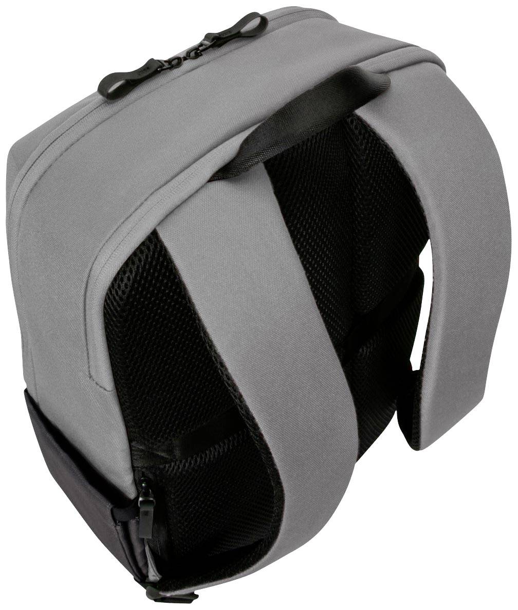 Ein grauer Rucksack mit zwei gepolsterten Trägern und einem Reißverschluss oben.