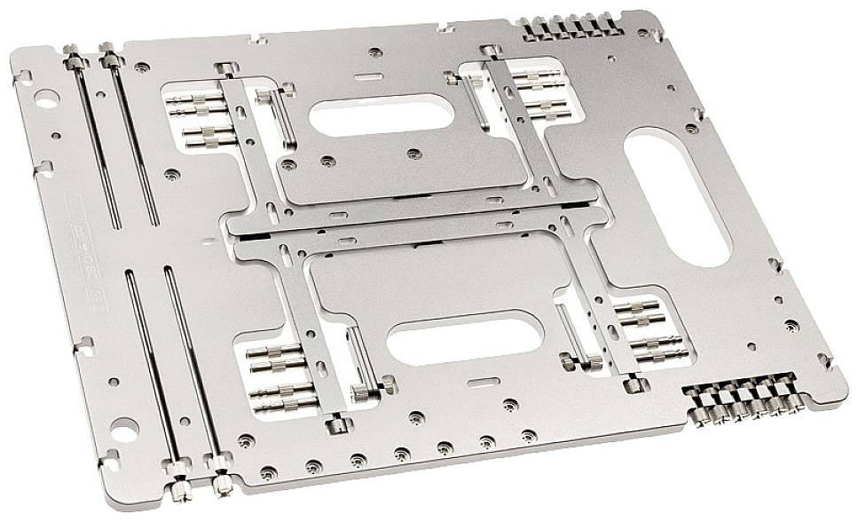 Metallisches Gerät zur Positionierung und Fixierung in technischen Anwendungen, mit mehreren Schienen und Aussparungen zum Befestigen.