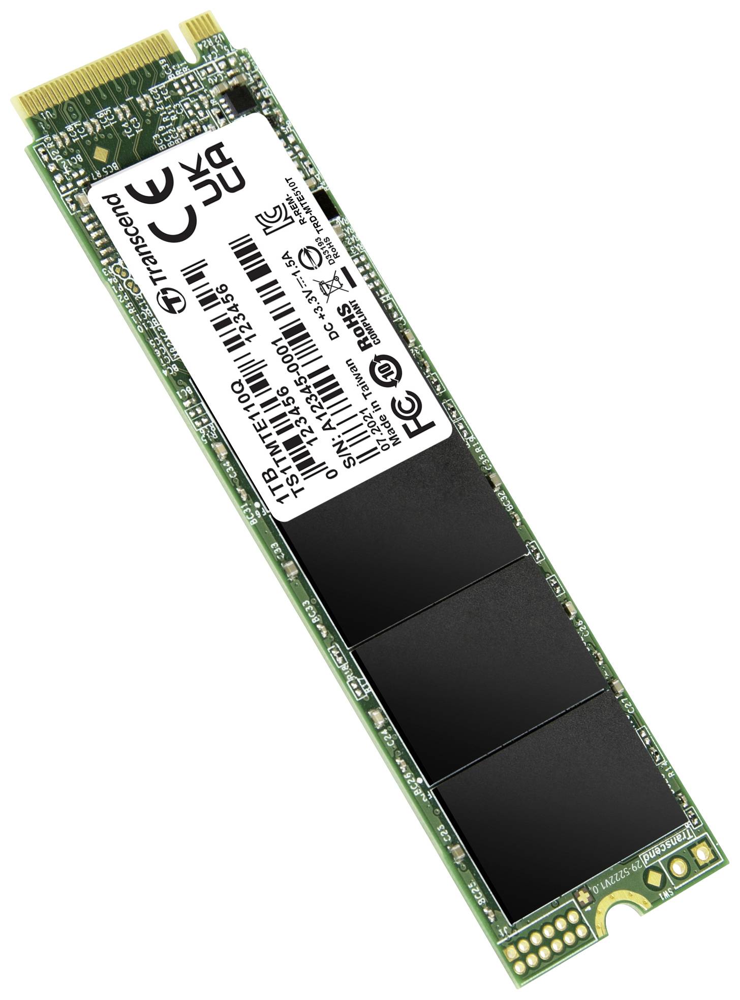 Eine grüne M.2-SSD mit Speicherchips und einem Etikett mit technischen Informationen und Zertifizierungen auf der Oberseite.