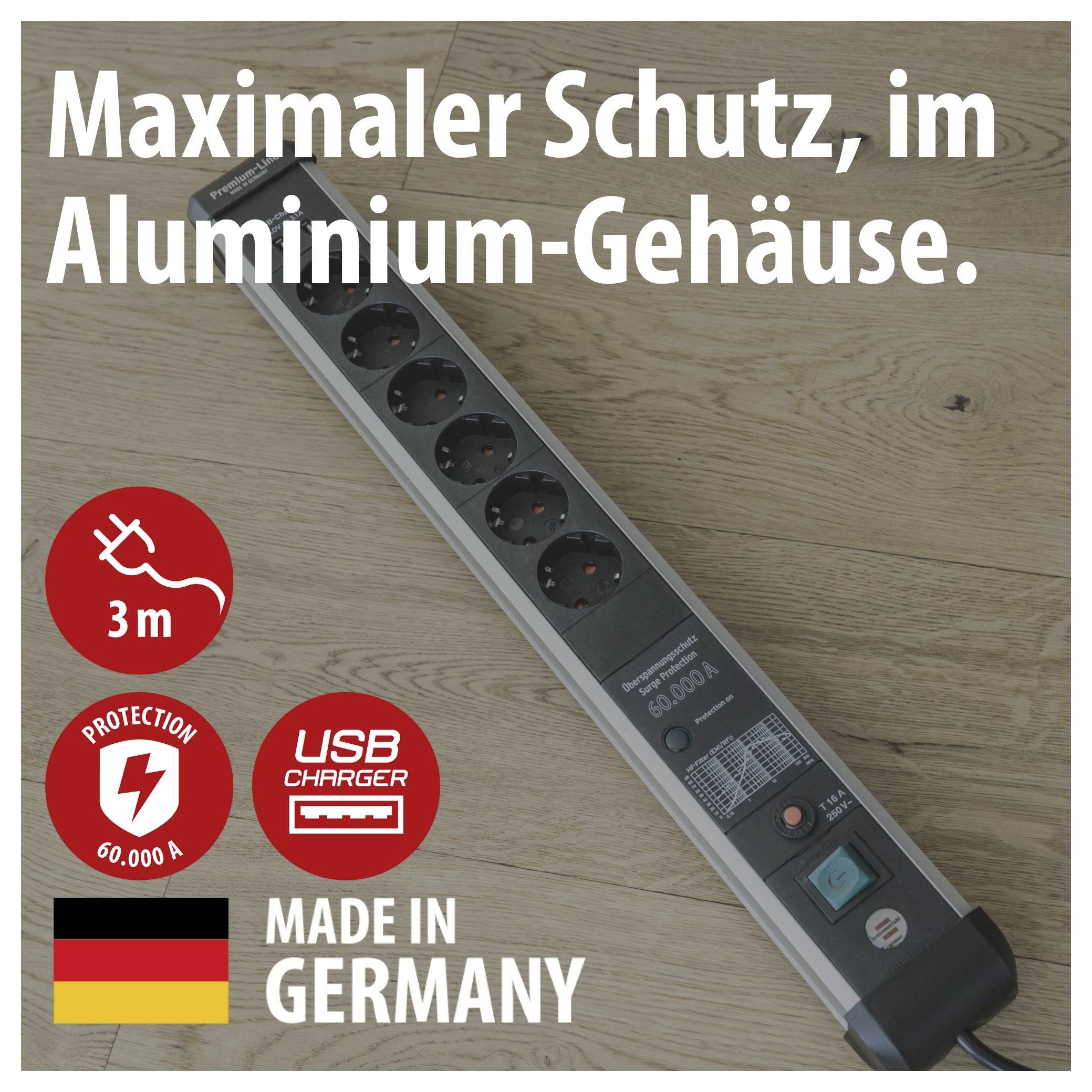 Mehrfachsteckdose im Aluminiumgehäuse mit 5 Steckplätzen und Schalter; Text wirbt mit 'Maximaler Schutz' und 'Made in Germany', 3 m Kabel, USB-Lader, 60.000 A Schutz.