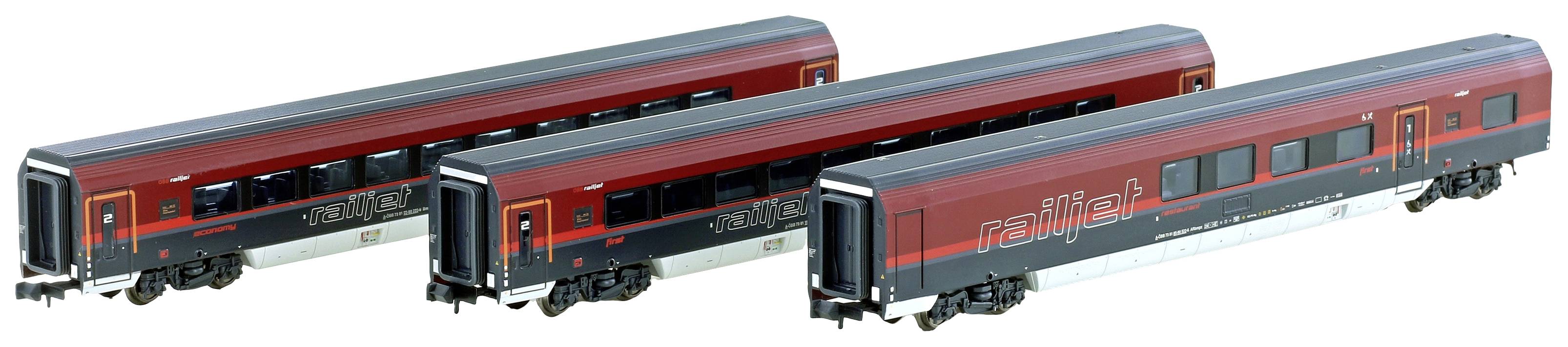 Drei moderne Eisenbahnwaggons in dunkelrot und schwarz, nebeneinander aufgestellt. Sie sind mit 'Railjet' beschriftet.