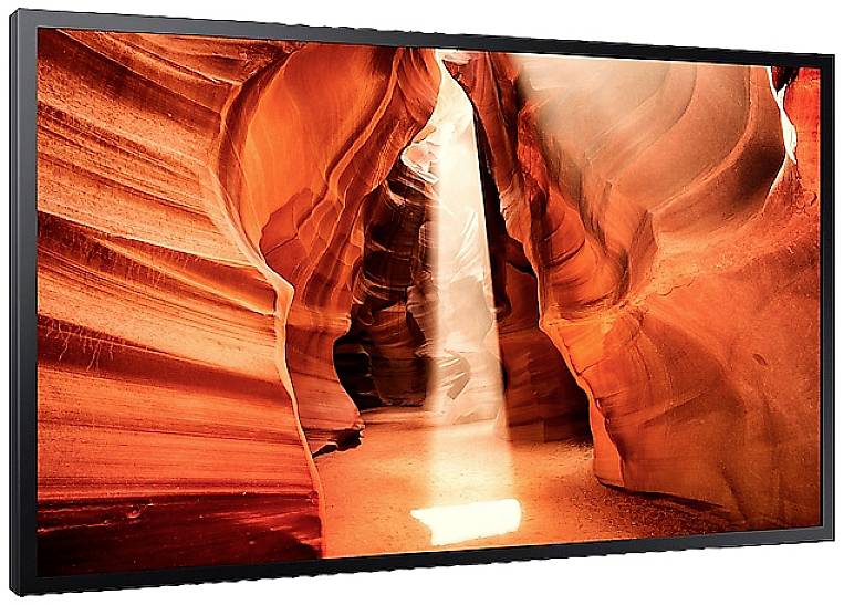 Das Bild zeigt den Antelope Canyon mit leuchtend roten Felswänden und einem Lichtstrahl, der von oben herab in die Schlucht scheint.
