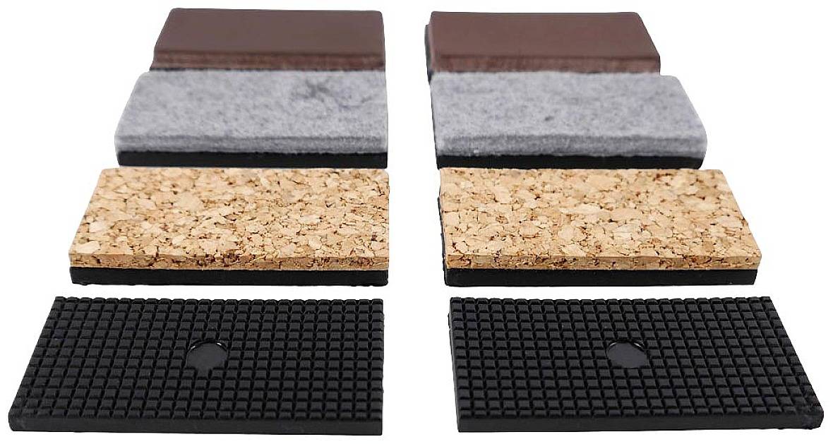 Sechs rechteckige Blöcke aus verschiedenen Materialien: Holz, Filz, Kork und Gummi. Sie sind in zwei Reihen angeordnet.