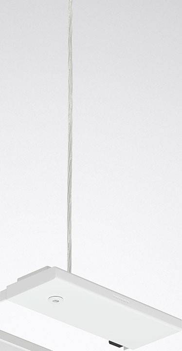 Eine hängende Glühbirne mit filamentfreiem Design, die vor einem neutralen Hintergrund schwebt.