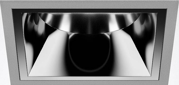 Ein glänzender, metallisch aussehender Spotlicht-Einbaustrahler mit einem glatten, reflektierenden Innenbereich, der Licht bündelt.