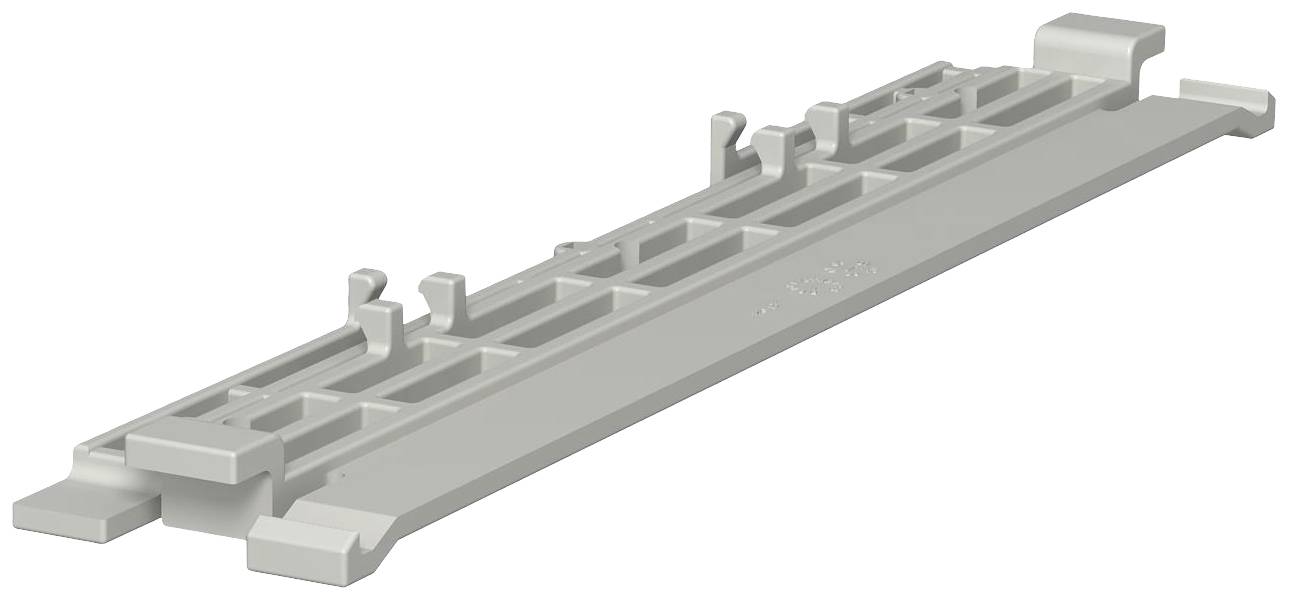 Ein graues, rechteckiges Kunststoffteil mit mehreren vertikalen Erhebungen und Aussparungen, möglicherweise ein technisches Bauteil.