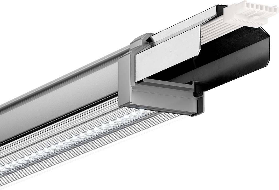 LED-Lichtleiste mit schmalem, silbernem Gehäuse und weißen Anschlüssen, geeignet für industrielle oder gewerbliche Beleuchtung.