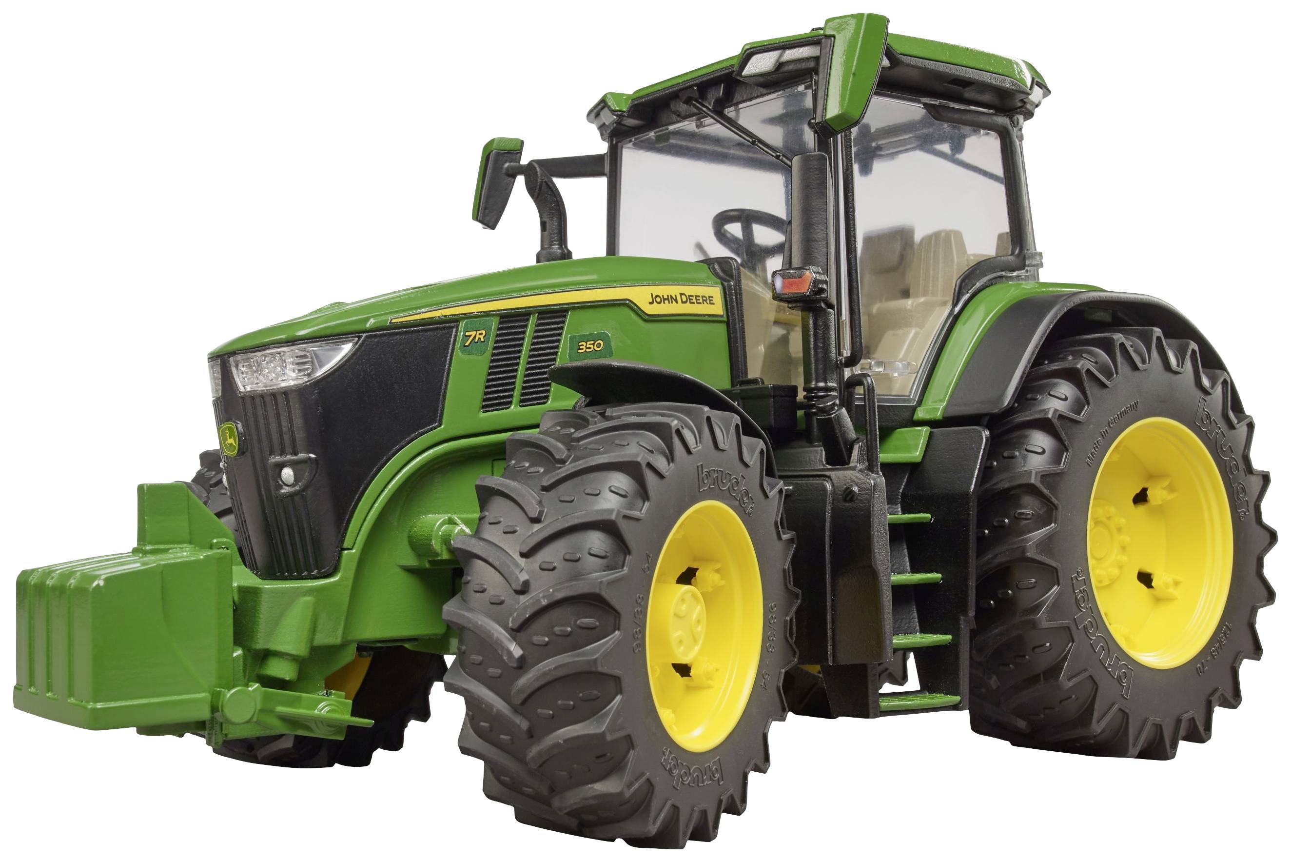 Ein grüner Traktor mit großen, robusten Reifen und einem markanten Frontgewicht, geeignet für landwirtschaftliche Zwecke.